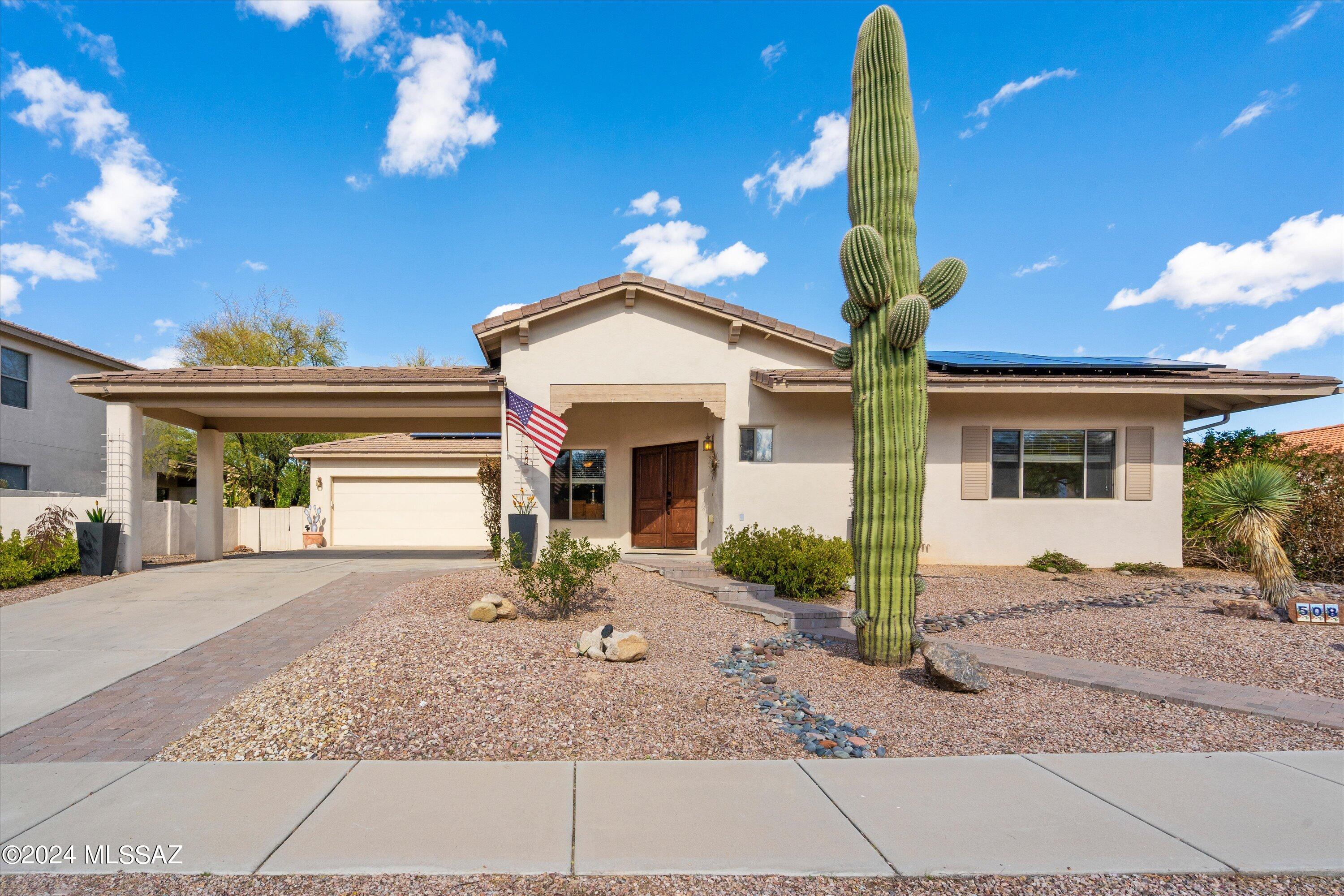 Amazing 4 bed 3 bath with pool in Oro Valley! This Baird home was built with quality in mind constructed with masonry and steel framing. Inside the home shines with an open floorplan, large rooms, and oversized windows allow abundant light throughout the home. An updated kitchen offers upgraded granite countertops, custom cabinetry, undermount sink and appliances. Separate bed/ bath opposite the other beds can function like a casita, bedroom, or home office allowing maximum living options. Outside this home the high-end design features doesn't stop as you will see a porte-cochère providing style and function for guests. A courtyard like pool and spa offers resort-like convenience and function for entertaining or relaxation. Price to sell; schedule your showing today.