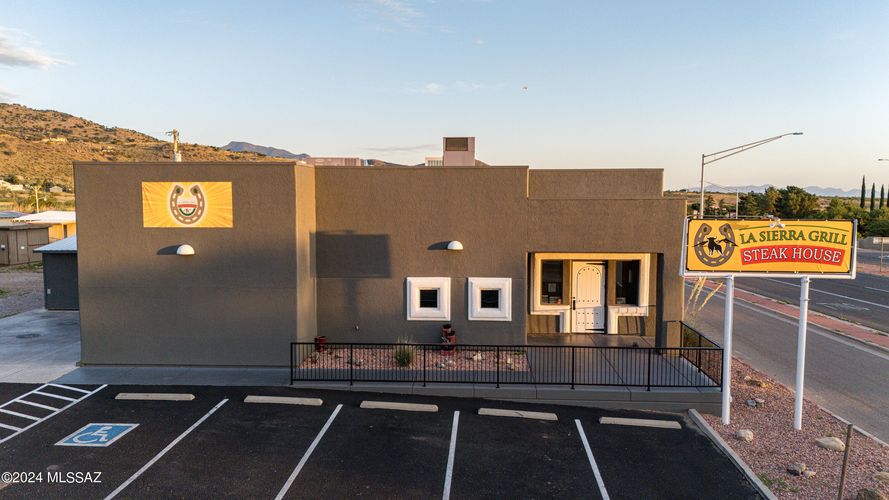 Incredible opportunity to own a locally treasured culinary location at the foot of the mountains. Completely rebuilt in 2012. High visibility on main highway. Building features an extensive kitchen, bar area, banquet room, and ample seating. There are 5 parcels included in the listing. (104-06-002E/104-06-002C/104-06-007/104-06-017/104-06-002a) . A premier dining destination for over 50 years within the local community. Its expansive layout, well-appointed kitchen, and idyllic surroundings, just minutes from Sierra Vista make it an enticing investment opportunity for discerning buyers. Class 12 liquor license included in sale.
