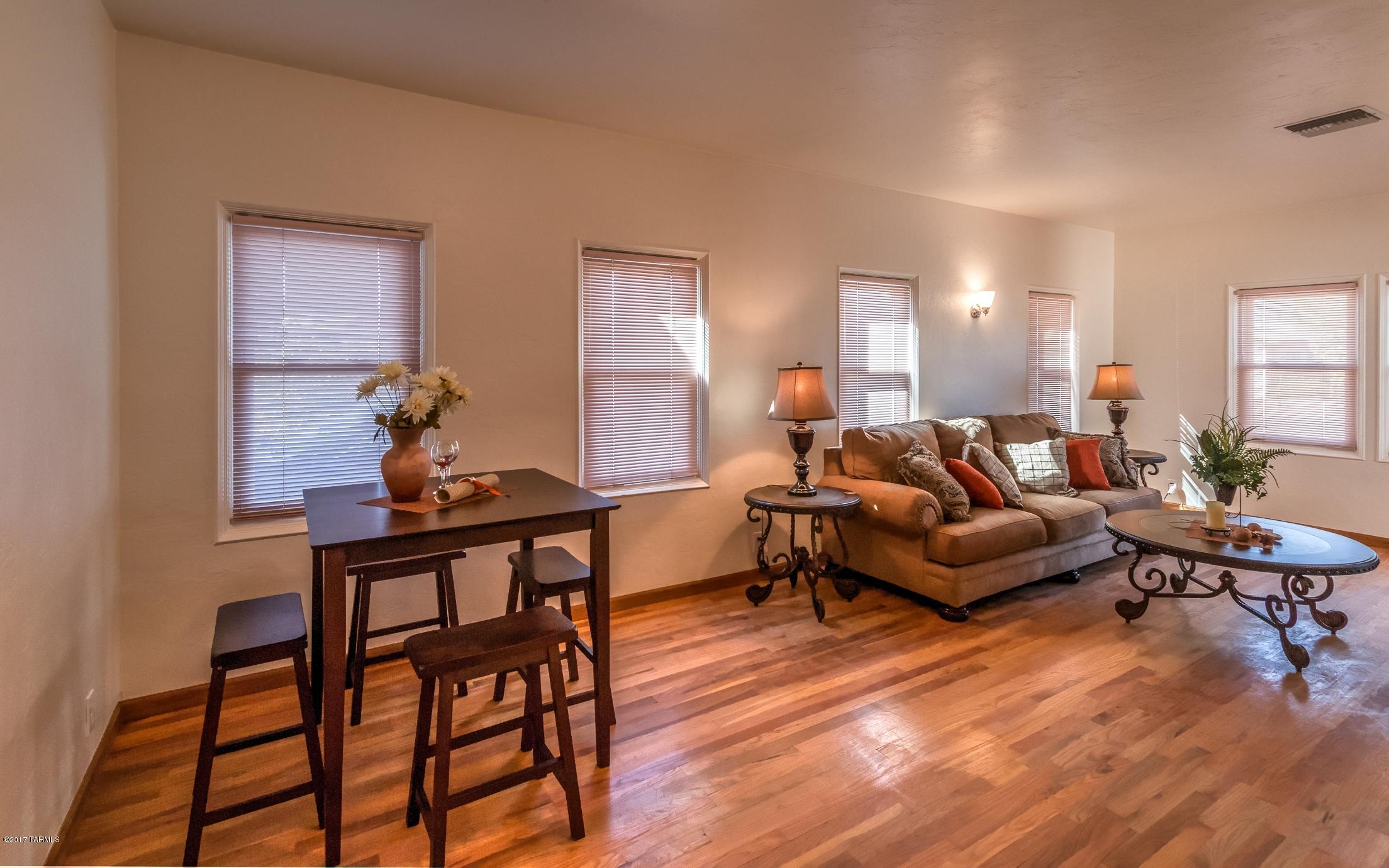 Beautiful 5 Bedroom/3 bath home in the heart of the city, short walking distance to the U o A. Old Tucson charm with many upgrades. Bright, and open floor plan- hard wood floors and ceramic tile thru-out. BIG SCREEN TV INCLUDED. Must see to appreciate.