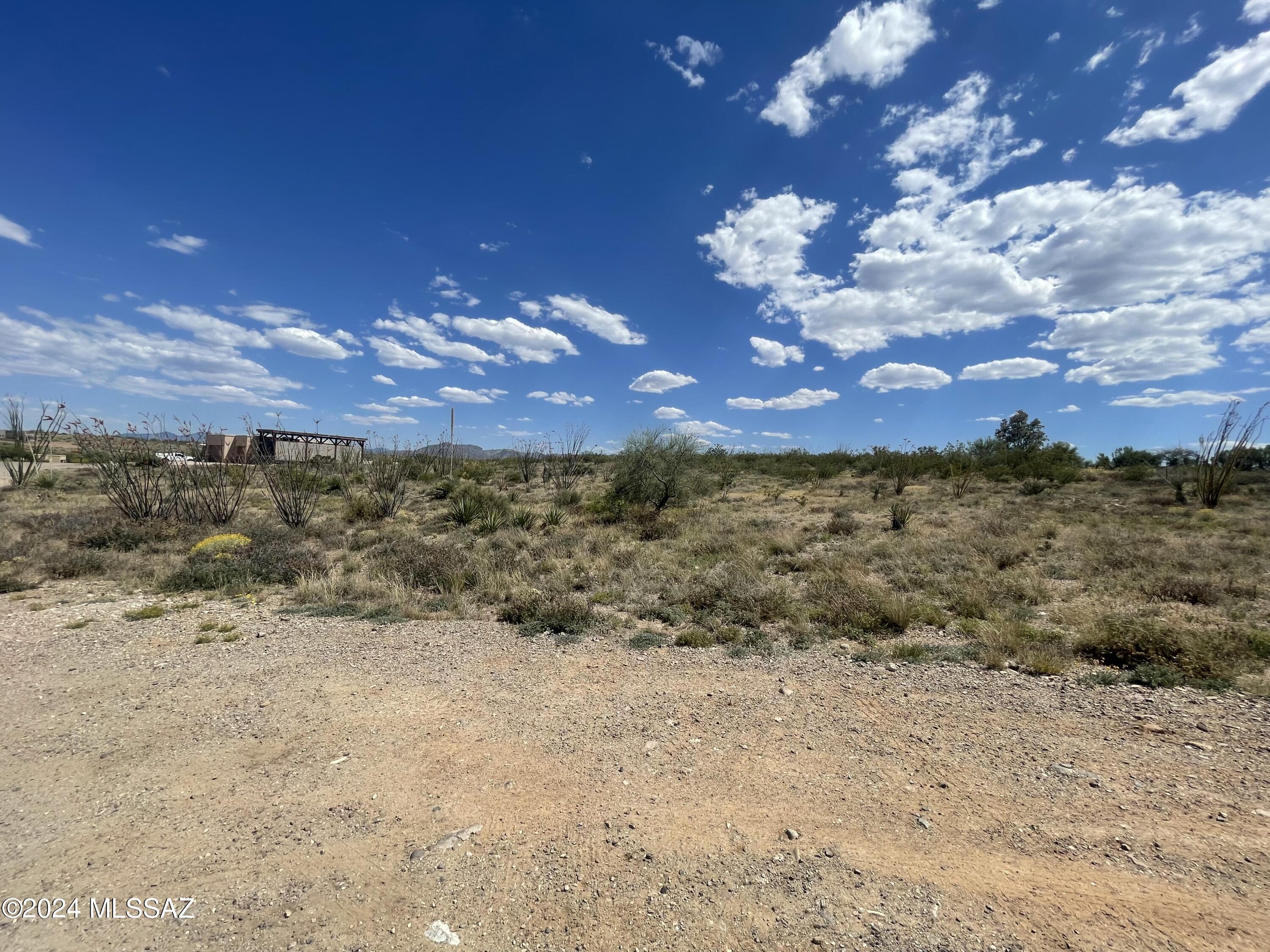 1.61 Acre Residential lot with views of the Rincon Mountains Ranges. Great homesite to build your new custom home. RV friendly community. Paved roads. Electric, gas, and water at lot line.
