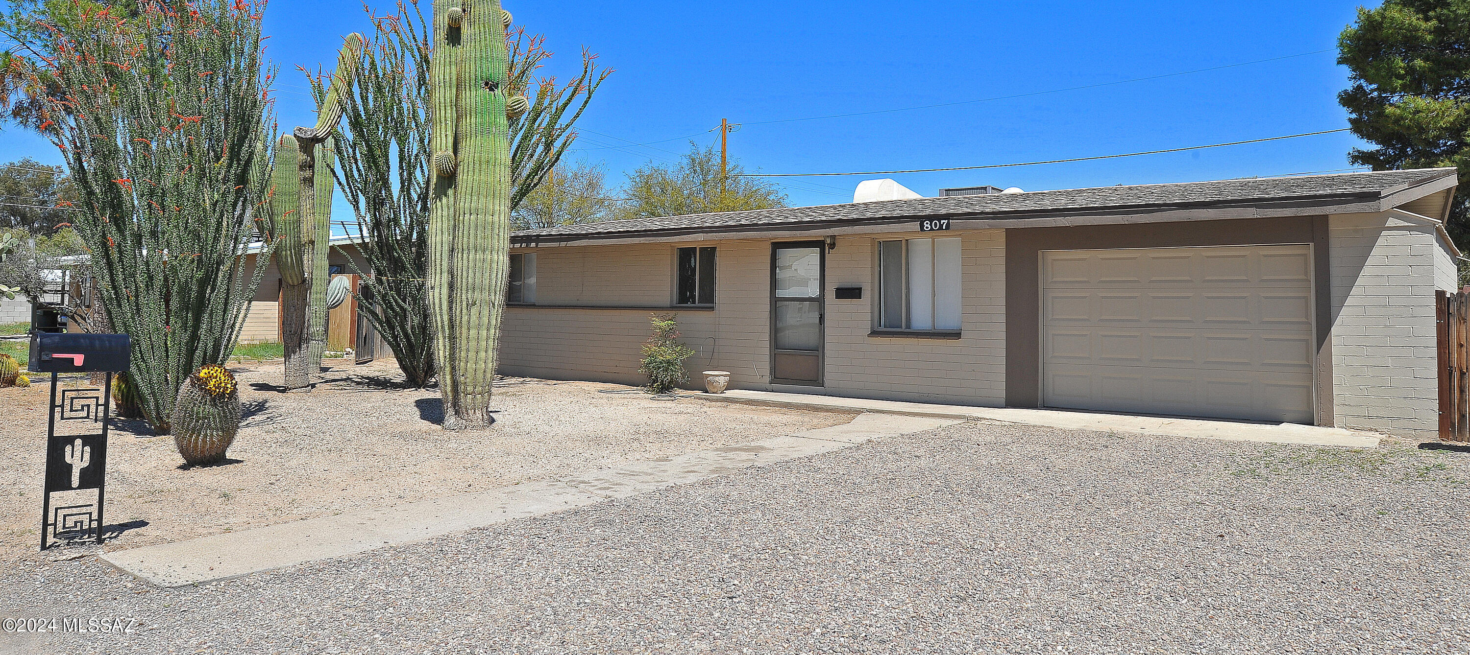 Great central location with large yard and 1 car garage!  4 bedroom, 2 bath home close to schools, restaurants, shopping, Reid Park & DMAFB.  Tile flooring throughout (no carpet), A/C, neutral interior paint, side by side refrigerator with water & ice dispensers. Home offers a living room with dining area, family room, large laundry room with washer/dryer hookups and additional storage space, large backyard with covered patio & shed, desert landscaped low care front yard, and a 1 car garage with tool storage cabinet & work bench. Non-smoking home. One year minimum lease. $45 application fee per adult. Subject to application process & credit approval.  Up to 2 pets considered with breed restrictions, pet fees & pet rent.  Call listing agent for additional information.
