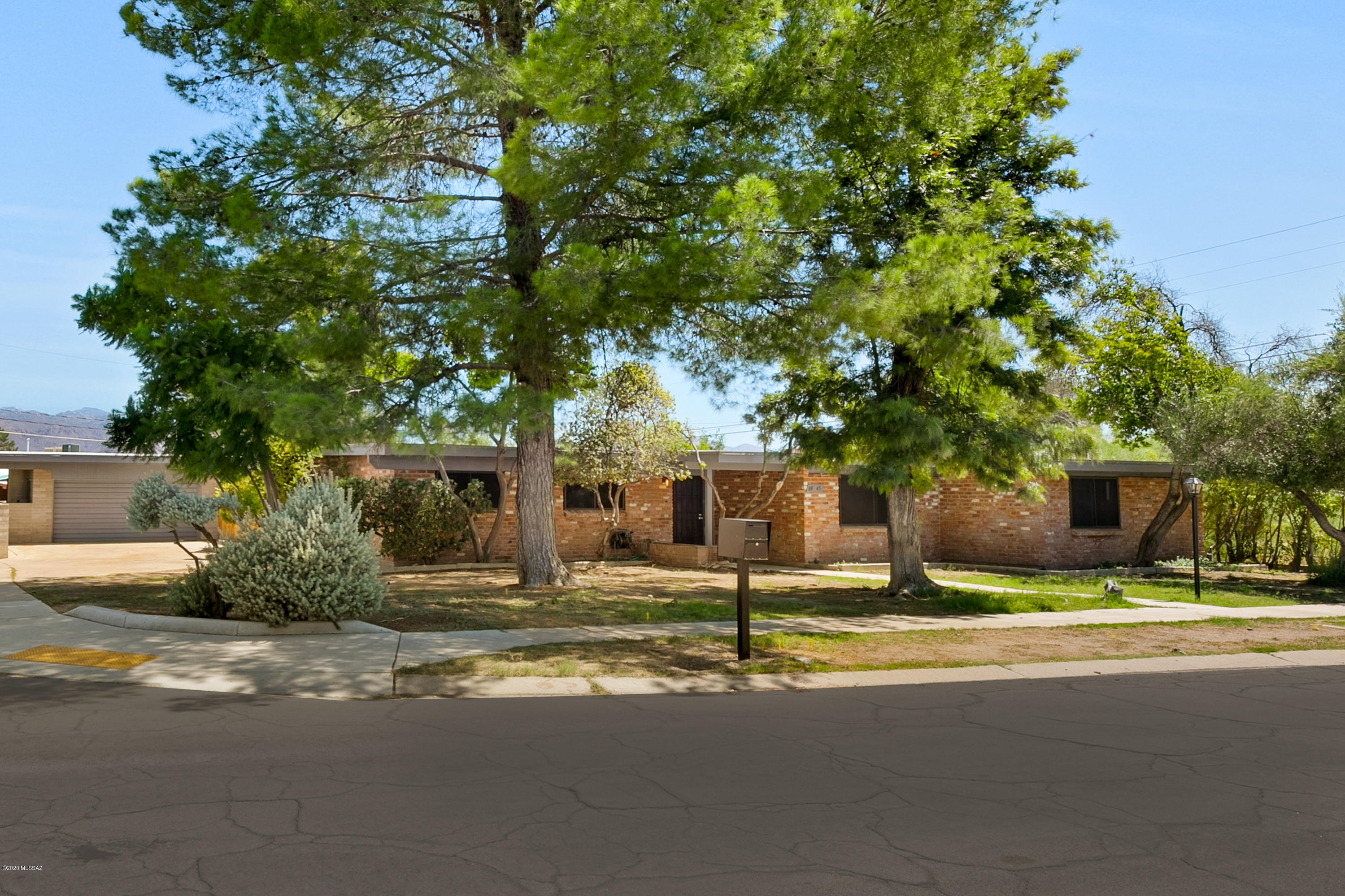 Five star home! Don't miss this gem, located in the desirable Eastern Hills subdivision. Excellent location! Two master suites, one on each side of the home! This 5 bedroom has 3 FULL bathrooms and is pre-plumbed in garage for a 4th. Enjoy the newly resurfaced and tiled pool with gorgeous views of the Catalina Mountains. Huge lot with two different access gates to pull in an RV or trailer. Two car garage has tons of built-in storage! New roof, new AC, new irrigation in front and back, new gates, new fencing and new INTERIOR!! The home has been FULLY remodeled- ask agent for complete list of upgrades and improvements! Truly one of a kind. Listing Agent is related to Personal Representative.