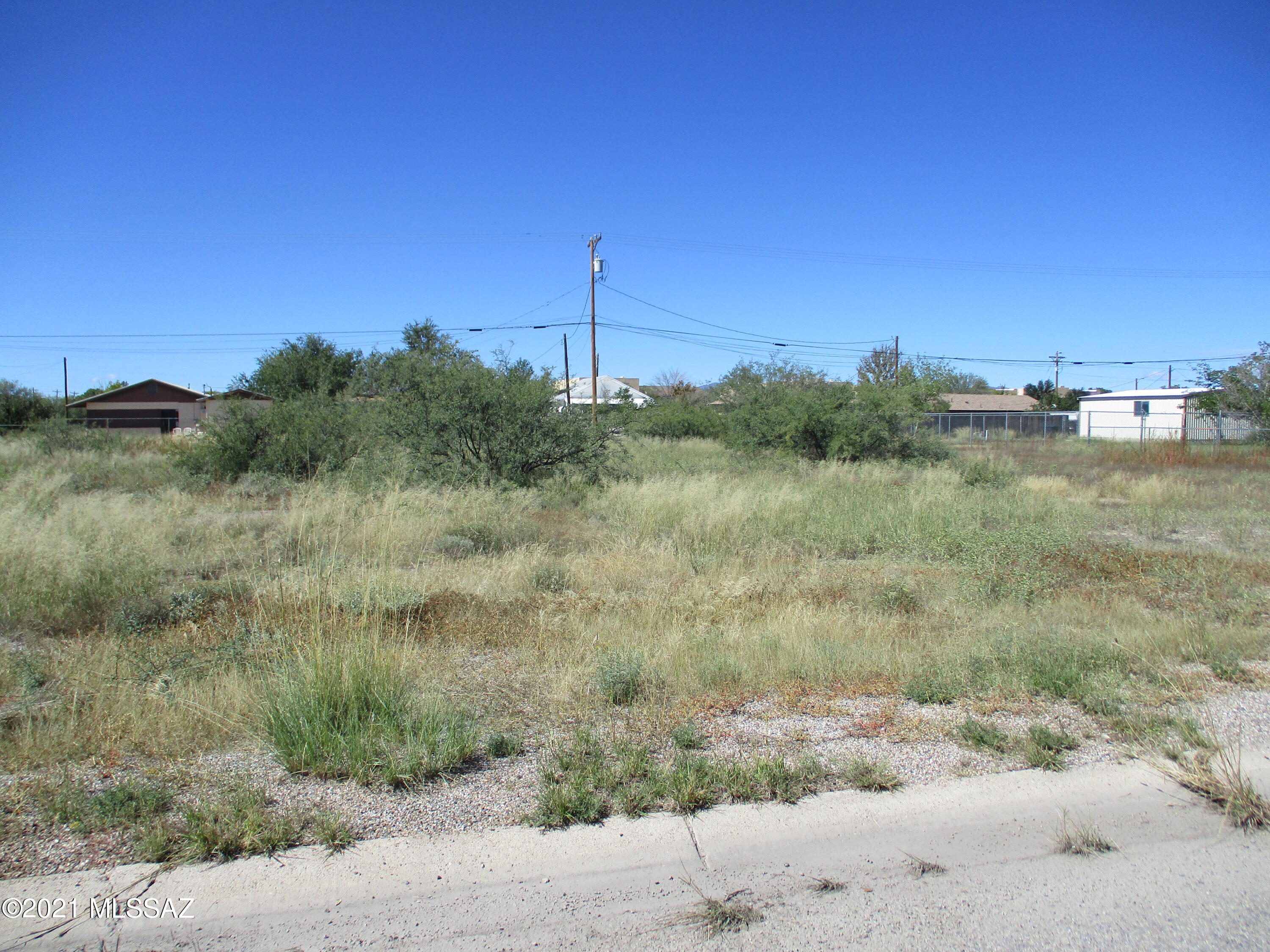 LARGE UNIMPROVED LOT ON S. COCHISE AVE.CLOSE TO SCHOOLS , SHOPPING AND HOSPITAL. BUILD YOUR DREAM HOME. LOT TO THE SOUTH IS ALSO AVAILABLE AT THE SAME PRICE.