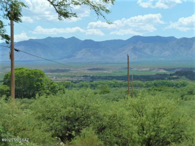 Priced to sell! Oh What a view!  Overlooks the Valley to the West all the way to the Whetstone Mountains.  Peaceful Area.   1/4 Well share is available per the deed. Power is on the road. 
A lower  portion of the property is in Floodplain,
Building site is not in the floodplain.  Owner will carry ..