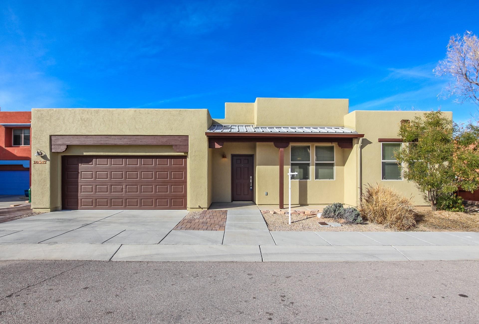 Beautiful Southwestern home in sought after Civano neighborhood. This home features an open great room layout with vaulted ceilings, fresh paint, tile and wood laminate flooring throughout. All new Whirlpool stainless steel appliances in kitchen to include existing refrigerator. Recessed lighting and ceiling fans throughout including upgraded chandelier in dining room and new brushed nickel door hardware on all doors. Water heater replaced in 2018. The exterior was recently painted and the roof was re-sealed in all areas. Brick pavers were added in all areas of the exterior along with artificial grass in the backyard, landscape lighting & irrigation. The den is currently being converted into a third bedroom. The garage is fully finished to include epoxy floors and insulated garage door.