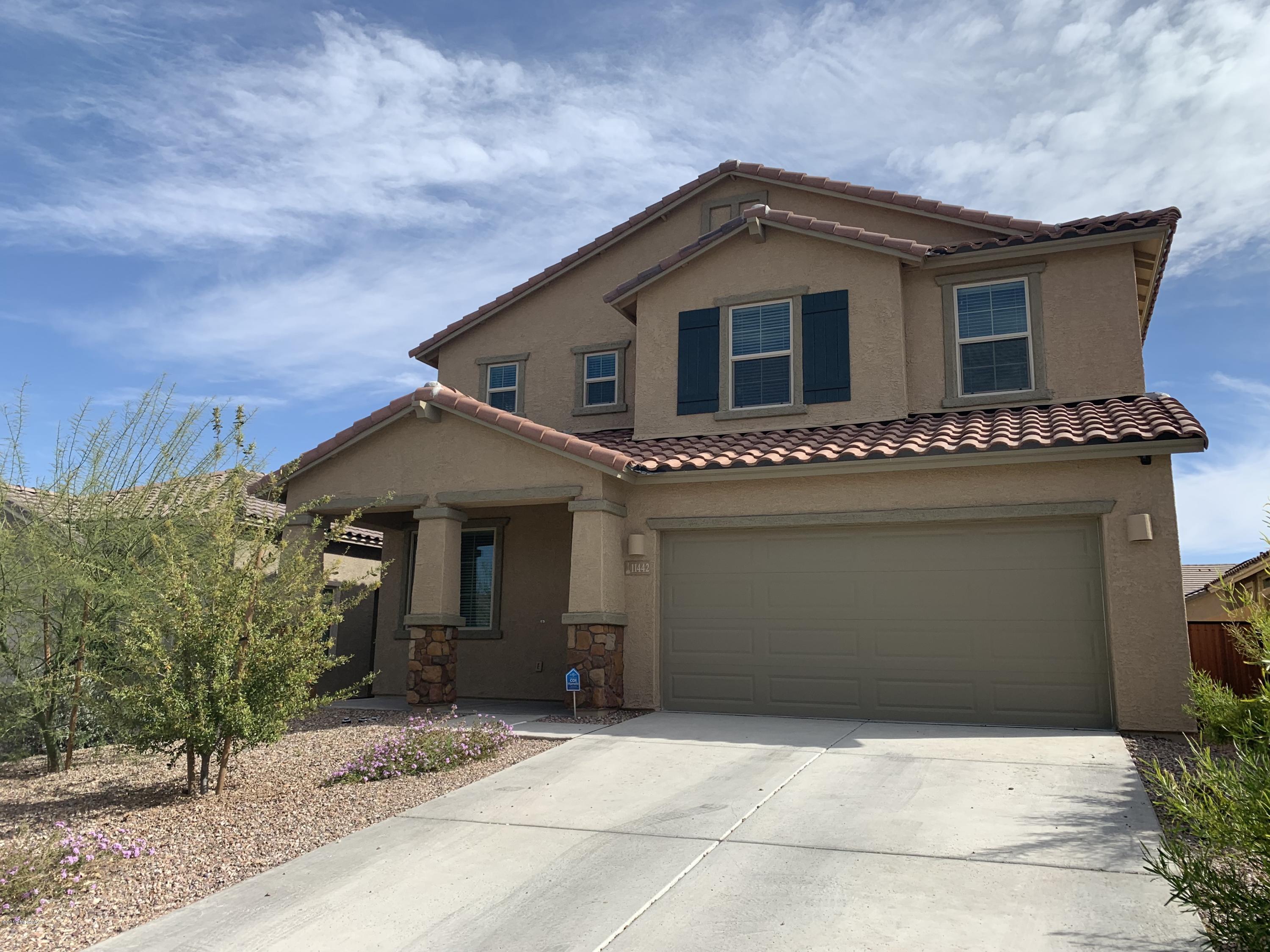 This meticulously maintained 5 bedroom, 3 bath home is located in the Vail School District, close to shopping and so much more! This amazing home has a loft upstairs and downstairs bedroom that can double as an office. The kitchen has gorgeous granite counters, an island, and S.S appliances. Great room has plenty of room for entertaining PLUS a separate living area. The master bedroom is large and has a walk-in closet, attached master bath w/dual sinks and a shower with separate tub. Upstairs laundry room is conveniently located next to the bedrooms. Epoxy flooring in the double car garage. This home is a must see!
