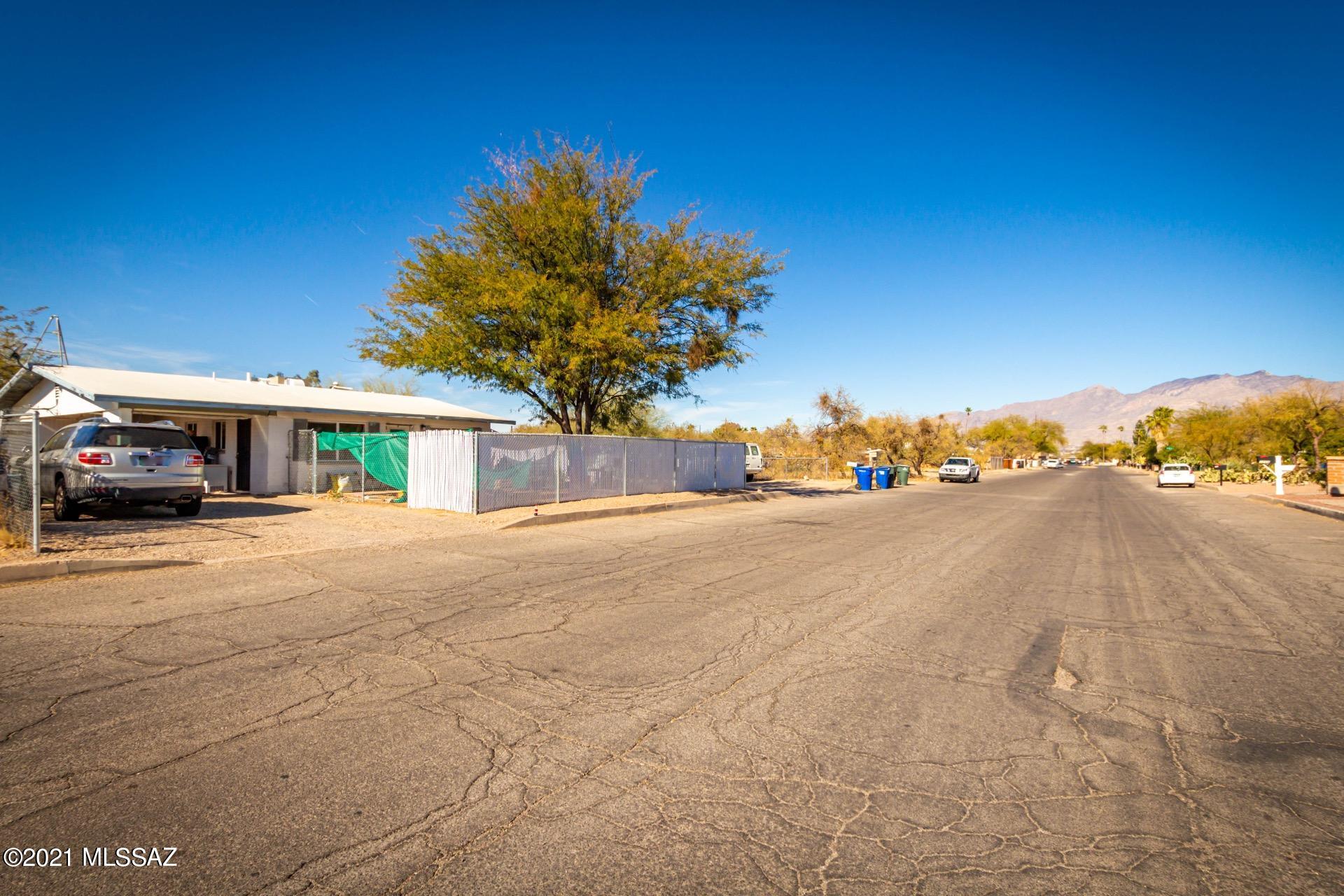 Must see 4 Plex near TMC. Property consists of a 2 bedroom 1 bath unit, 2 1 bedroom 1 bath units and a studio. Large lot with plenty of parking and close to everything. Property is fully occupiedl. Huge value add opportunity, this listing will not last!