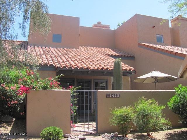 Ventana de Sabino has the reputation of being one of the most desirable communities in the Catalina Foothills. This home proudly claims one of the largest patios in the development., a delightful space to take in warm afternoon sunsets. Open living room and dining room have vaulted ceilings and a wall of windows looking out to the patio bringing in lots of light.   Kitchen is large with lots of cabinets and has see through counter to dining room.  Guest bedroom and bath are downstairs Upstairs has master bedroom with walk in closet, large master bath and views to the court yard.  An upstairs loft provides room for an in-home office or exercise room. Amenities include 2 pools, tennis courts, club house, and exercise room. Walk to Sabino Canyon Recreation Area in the Coronado Nat'l Forest.