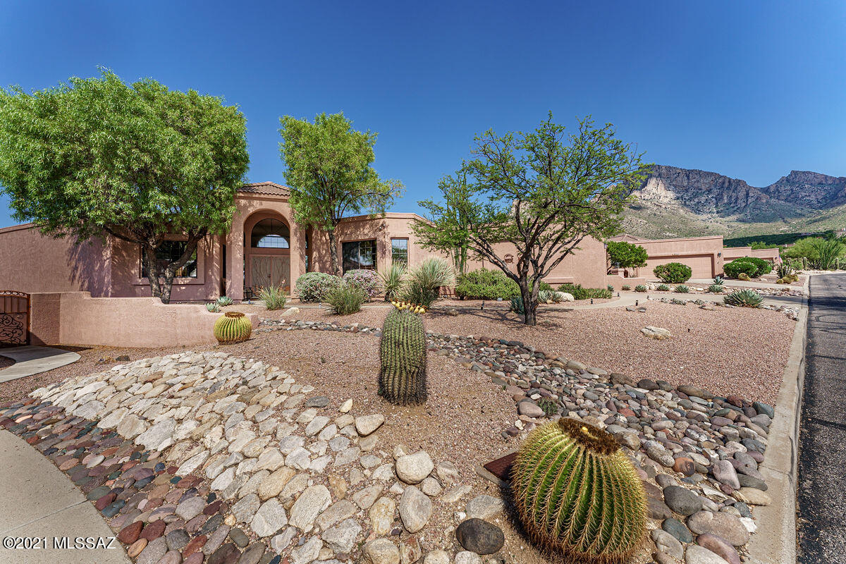 RAMS HILL AT LA RESERVE-Rare in this market! Beautiful, open, well maintained 3BR/2.5BA with extraordinary mountain views. In this quiet gated community, the property offers privacy, several patio areas and wonderful desert landscape to enjoy it all. The home offers many significant upgrades including two zone 3 year old HVAC systems, remodeled kitchen and master bath with soaking tub, replacement of all poly pipes just to mention a few. There is a fireplace in the family room and reverse osmosis drinking water system in the wet bar, vaulted ceilings in the living room, 4 citrus trees and a working fountain in the backyard. LR sofa, lamp and coffee table available separately. Steps from the community pool and spa, this home is perfect for entertaining and as a private serene retreat.