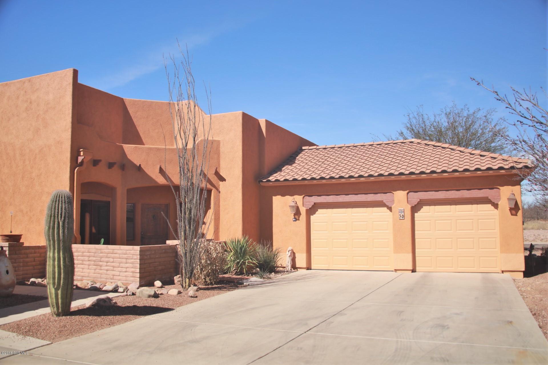 Premier Townhouse on stunning corner lot location. Home includes artist studio, lovely small back garden with views across to archaeological site. Drip system; raised bed for vegetable herb garden. New stainless steel microwave, Stainless steel Fridge and gas stove new within 2 years. Community pool and spa and club house. Barrio Recreation is available for purchase. Freshly painted inside and out. Close to the artist Village of Tubac with shops, galleries and restaurants.