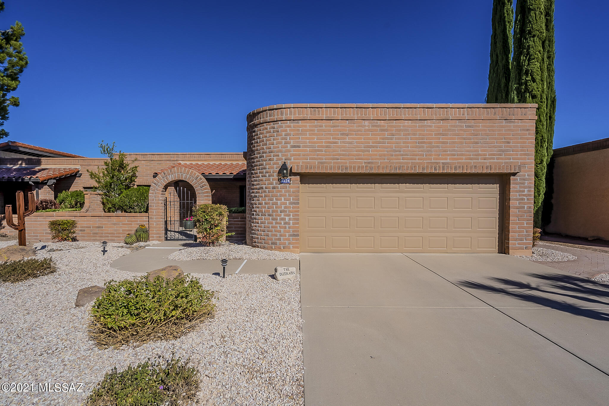 Relax pool side and enjoy the mountain views. Hit the walking trails or take the golfcart to one the of nearby courses or GVR rec centers. What more can you ask for? This townhome in the heart of Green Valley features two bedrooms, two baths, a den, and a gorgeous backyard pool. Upon arriving you are immediately welcomed by the newly landscaped yard and quaint front patio. The kitchen was remodeled in 2016 with granite counters and stainless-steel appliances. The spacious family and dining area is the perfect entertainment space with its beehive fireplace and vaulted ceiling. The main bedroom suite features dual vanities, a large closet, and updated shower. Take a moment to relax in the den or step out into the screened patio to see the views and take a dip in the pool.