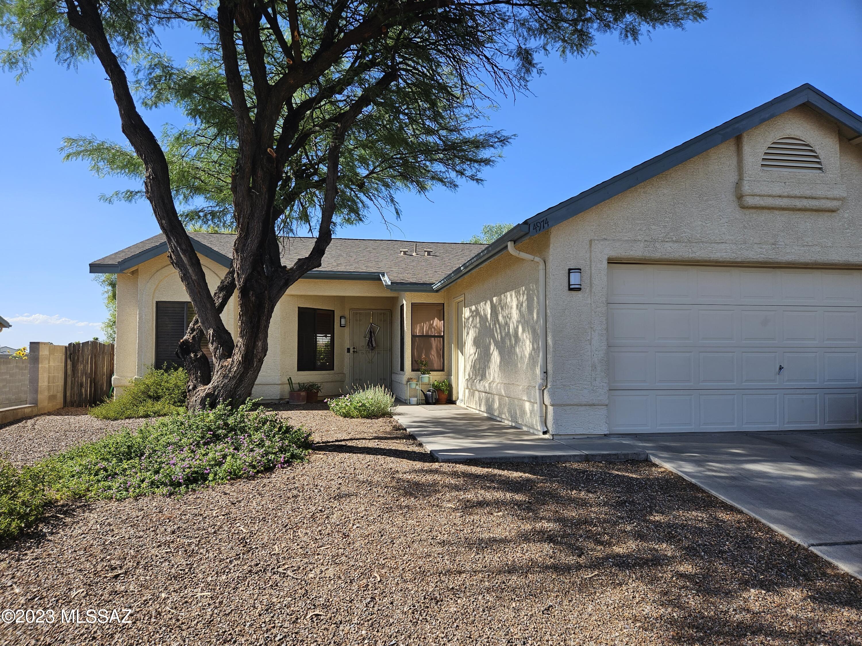 Come check out this fabulous 3bdr 2 bath home. As you enter the home you will find a formal living room/dining room or spectacular great room your choice. Spacious with high vaulted ceilings and lots of natural light. As you pass through you'll find yourself in a joy of a kitchen with lots of counter and cabinet space and custom built in eat in nook. Every bedroom is large and boasts a walk-in closet. The main bath has dual sinks and large vanity. Master bath has separate garden tub and large shower with beautiful tile work and dual sink vanity, plus his and hers closets. The back yard is a gorgeous oasis with lush grass lawn, small garden, oversized covered back patio and spectacular views of our desert sunsets with no rear neighbors. Schedule your appointment now!