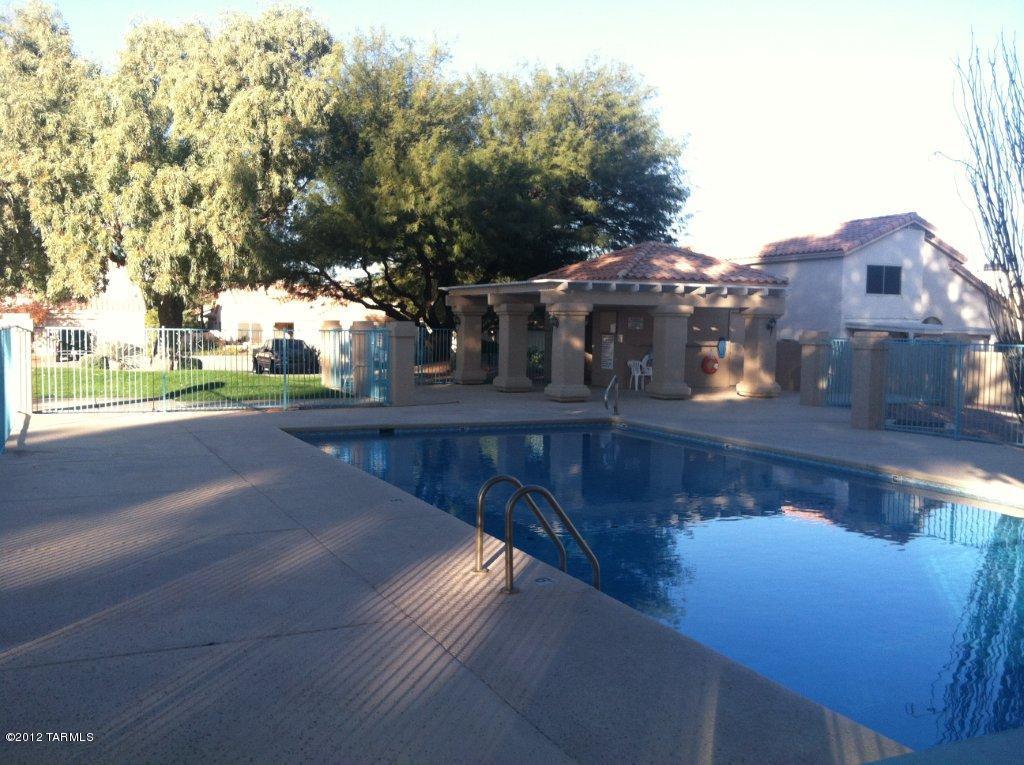 Great 3 bedroom home in a extremely cute neighborhood with a community pool. Home is in immacualte condition and ready to move into. Property includes washer, dryer, fireplace, master suite with two closets and great views from the guest bedrooms.