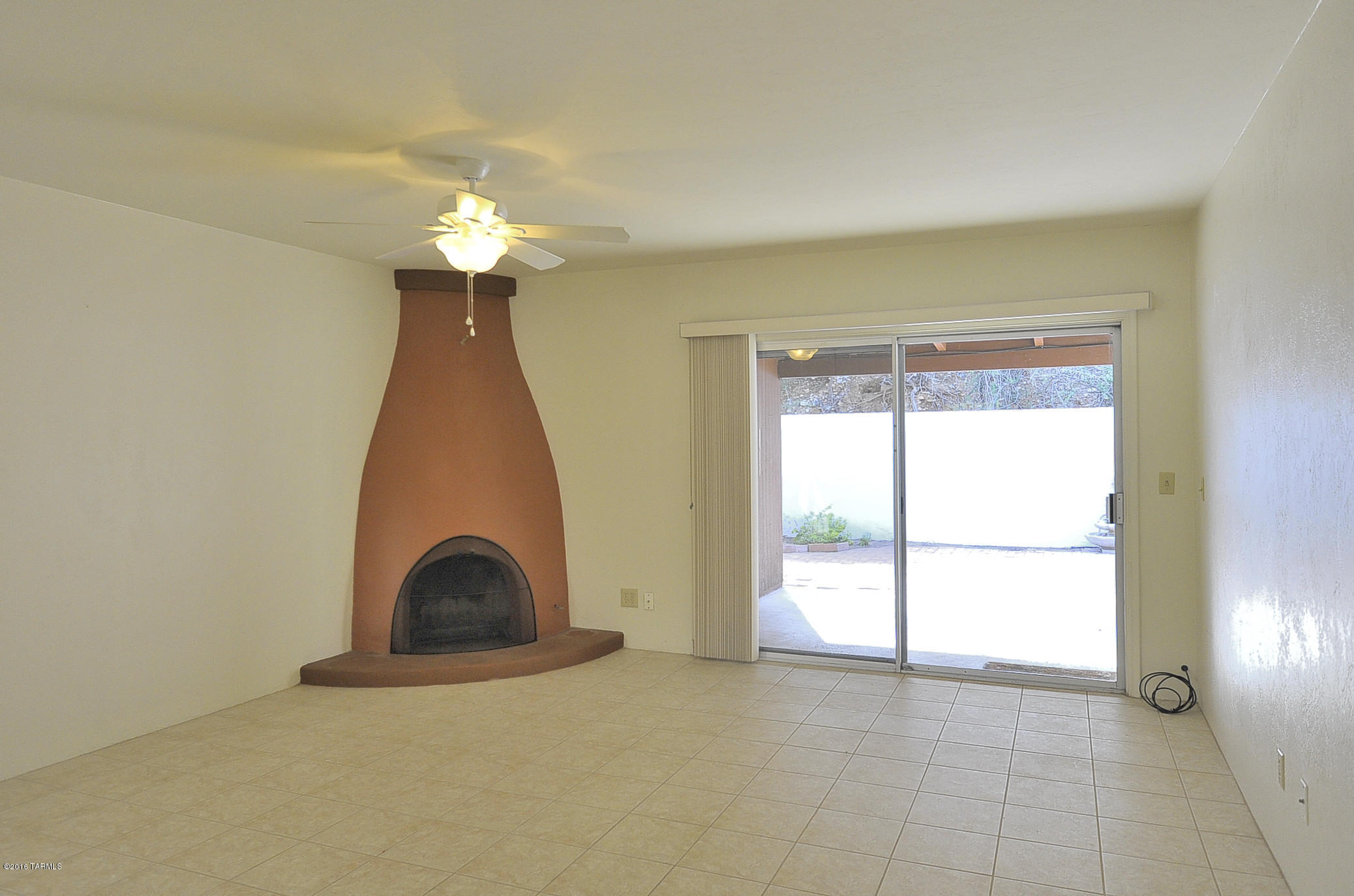 This light and airy townhome is located in a well established Foothills community.  Ceramic tile in all living and baths, carpets in the bedrooms.  Spacious master has access to the rear yard.  Enjoy the views from the living while cozying up to the fireplace during those cold winter nights.  Attractive low care rear yard, with extended pavers, full length covered patio to enjoy those mountain views.  Minutes to Trader Joe's, Starbucks, dining and Rillito River Walk.   Ask about #3158