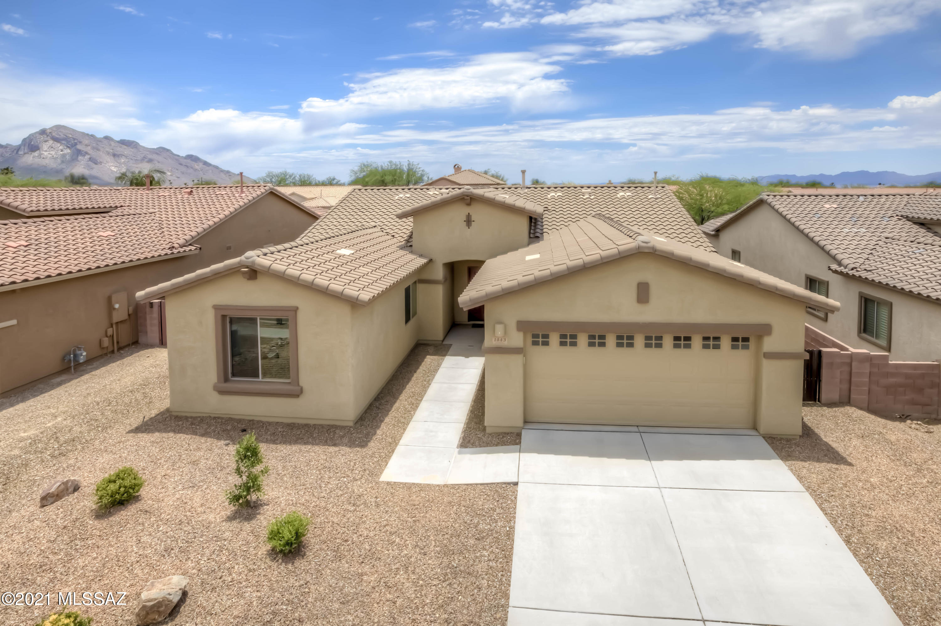 Upgraded home located Verde Ranch & Wilson School District. Open floor plan with separate dining room. Large great room which opens to upgraded kitchen w/maple cabinets, corian counters and breakfast room. Designer accents, ceramic tiled, wood floors & neutral carpet. Master bedroom suite features walk-in closet, separate tub & shower and granite-like cultured marble. Landscaped backyard with built in Bbq, and mountains views.