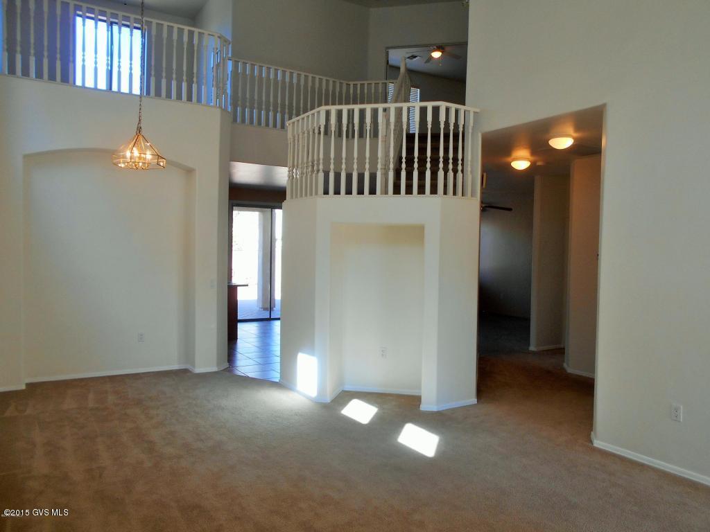 Gorgeous, spacious and move in ready, 4 bedrooms/3 full baths home in great condition. Open floor plan. Light and bright living/dining room with soaring ceiling. Kitchen with pull out cabinets and good size pantry. Convenient family room. 1 bedroom and 1 full bath on main level. Master bedroom, 2 extra bedrooms and loft on 2nd floor. Master bath with double sinks, garden tub and separate shower. Fully landscaped and private backyard with pavers, extended porch and No rear neighbors. 2 car garage. 1 year home warranty. Walking distance to neighborhood park ''Parque del Sol'' and walking trails. Schools: Copper view elementary, Anza Trail middle and Walden Grove high school. Enjoy all the amenities that Rancho Sahuarita offers: Pools, Parks, GYM, Lake park etc.
