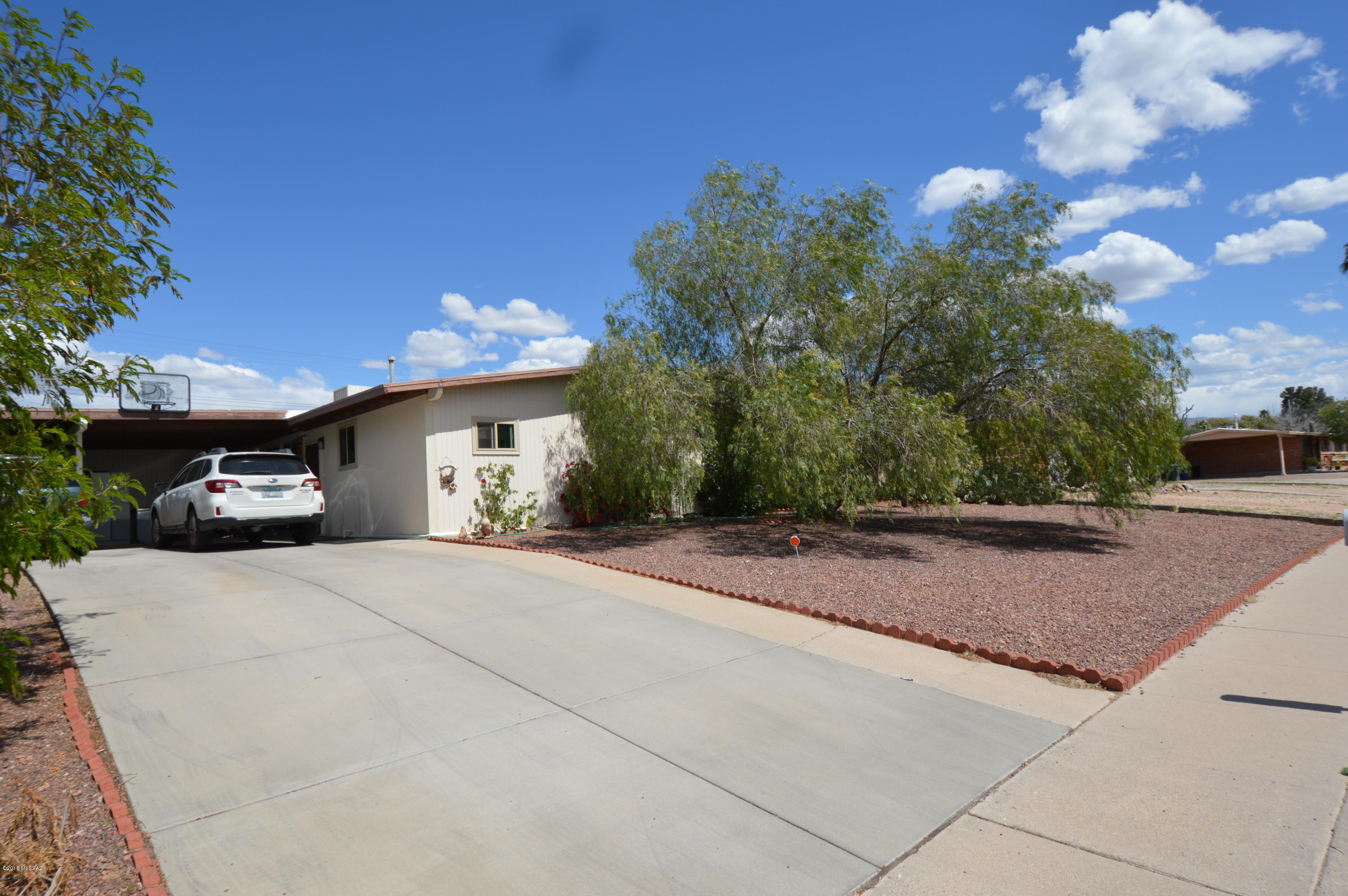 Welcome home! This charming and well maintained 3bdrm/2ba adobe brick home is within walking distance to local elementary school and Jesse Owens park. Home features a galley kitchen with quality appliances with lots of storage and counter space. Spacious living room leads to the large back yard with so many options. New upgraded windows and slider for improved energy efficiency. Gazebo and large storage shed may convey with acceptable offer.