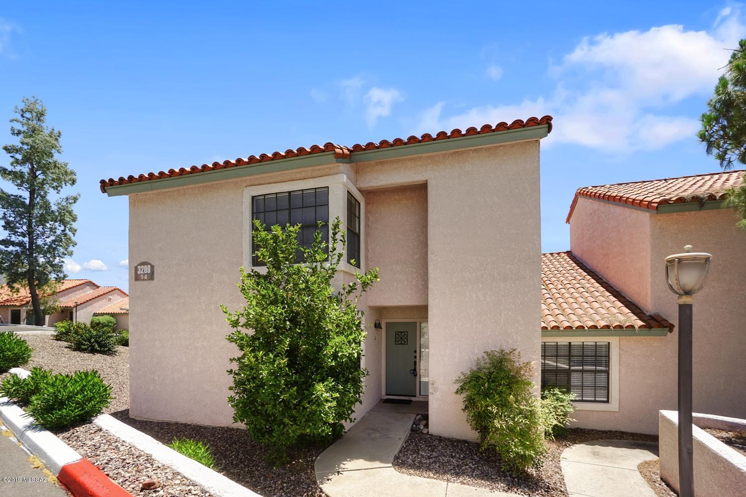 Catalina Foothills Resort style condo- 2 bdrm/ 2 bath-Two-Story. Efficient kitchen w/ SS appliances, living & dining room, and one bdrm and bath downstairs. Master bdrm and bath located upstairs. Carpet/tile flooring, washer/dryer, ceiling fans, single carport, covered patio, community pool/spa, tennis and clubhouse. Very convenient to shopping and Encantada Mall. HOA water will be rebilled to tenant. All Electric Home- Decor Only fireplace. (Campbell/Skyline