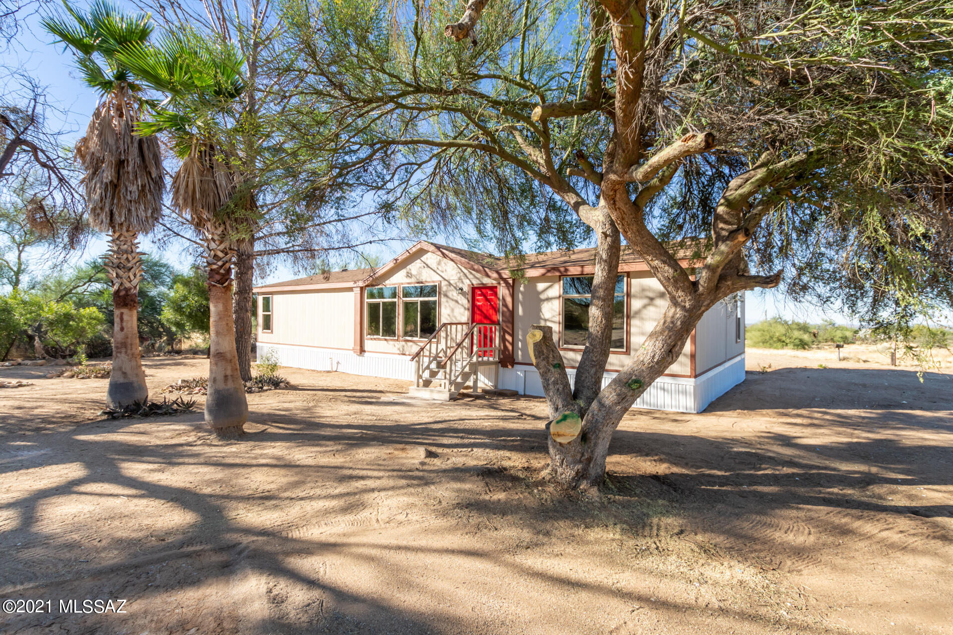 Beautifully remodeled 3 bedroom, 2 bath home located in a peaceful neighborhood on approximately 1.48 acres. Turn-key with new: flooring, light fixtures, bathroom vanities, brushed nickel fixtures, new water heater, new AC, and so much more beautiful finishes throughout. The home is welcoming with warm neutral tones and ready for your personal touch. This Kitchen- complete with new stainless steel appliances and modern cabinetry.  Step outside into the huge yard with plenty of space to make it your own. Owner is a licensed agent.