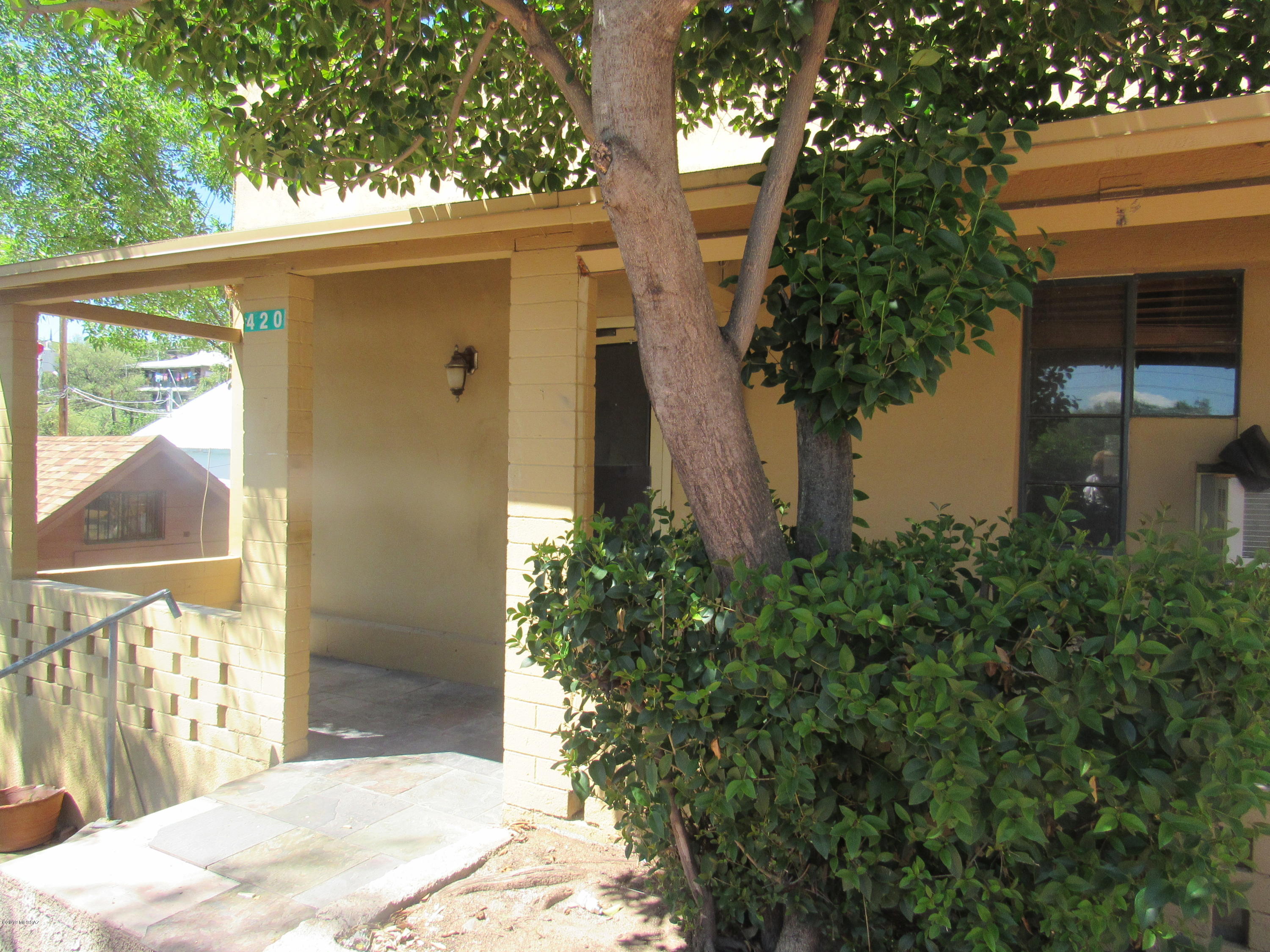 Two bedroom one bath home located on a rear lot on W. Walnut Street with stairs going to the property.  Nice kitchen with range, oven, refrigerator, bonus room.  Nice laminate flooring, covered front porch.
Call listing agent for key.