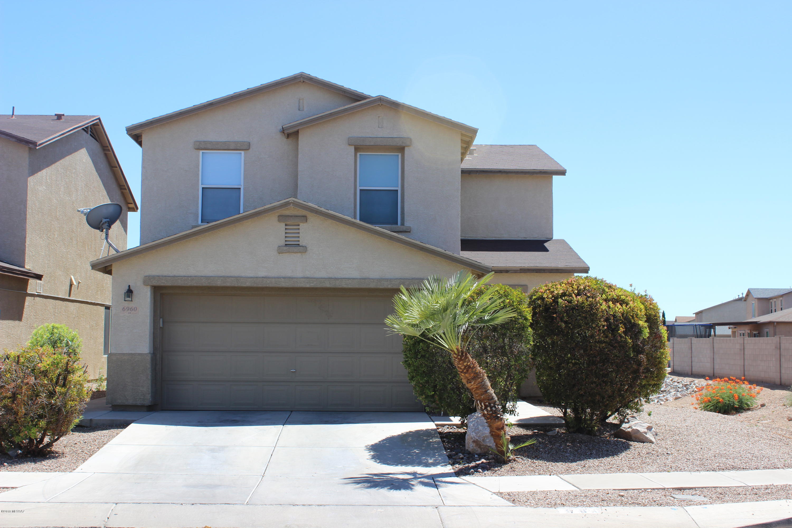 Beautiful, two-story, 3 bedrooms, 2 baths, contemporary home in Julian Ranch. Loft area upstairs. Perfect for entertaining guests or kids play area. Huge walk-in closet in master bedroom. Lots of storage space. Large backyard for entertaining your guests. No neighbors behind you! All appliances including washer and dryer convey! This lovely home is located close to Davis-Monthan Air Force Base, Raytheon, and IBM. Easy access to Hwy I-10 and Tucson airport. Don't miss out on this great opportunity! Make an offer today!