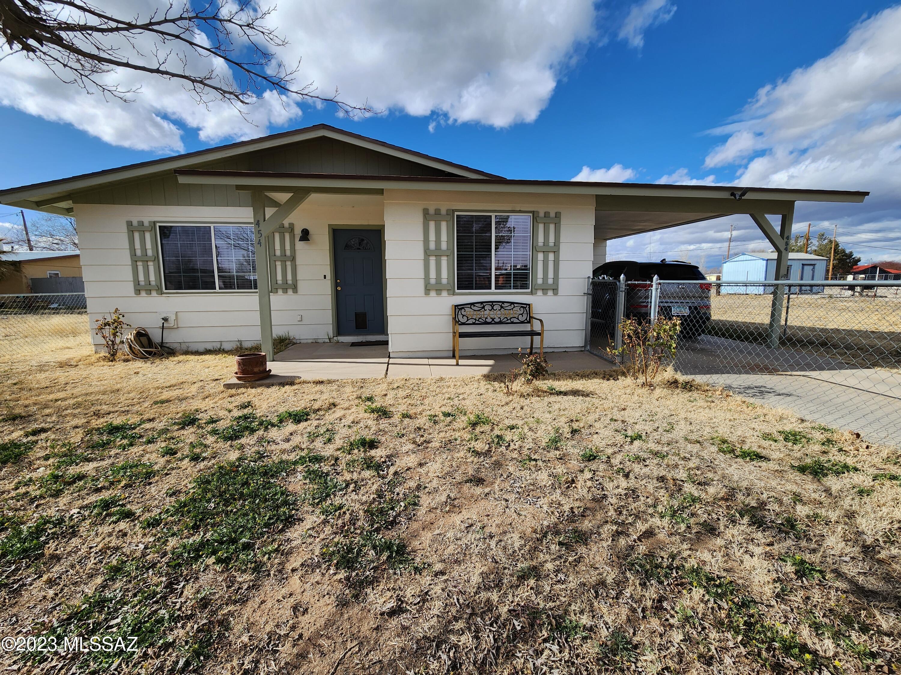 Renovated 2 bed 1 bath Bungalow on Large City lot in the Heart of Willcox. Quite neighborhood, Paved Street, RV Parking available, Double gates in back via Alley, 30 amp and 110 plugs. Outdoor Sitting area, pavers and Pergola ( new shade screen but not currently installed)  
This home has NEW Roof, NEW HVAC, NEW Kitchen with Custom Wood Cabinets with inserts and Rollouts and Granite Countertops, NEW Paint inside and out and Upgraded Electrical in Kitchen. 2 large sheds in Back Yard - Wooden a workshop with Electrical and Metal Shed has Thick Concrete Foundation and Shelving on both side for storage.  Additional Storage room under Carport.  
Washer and Dryer are NOT included but can be purchased.  Almost all the furniture can be purchased as Well for an additional Cost.