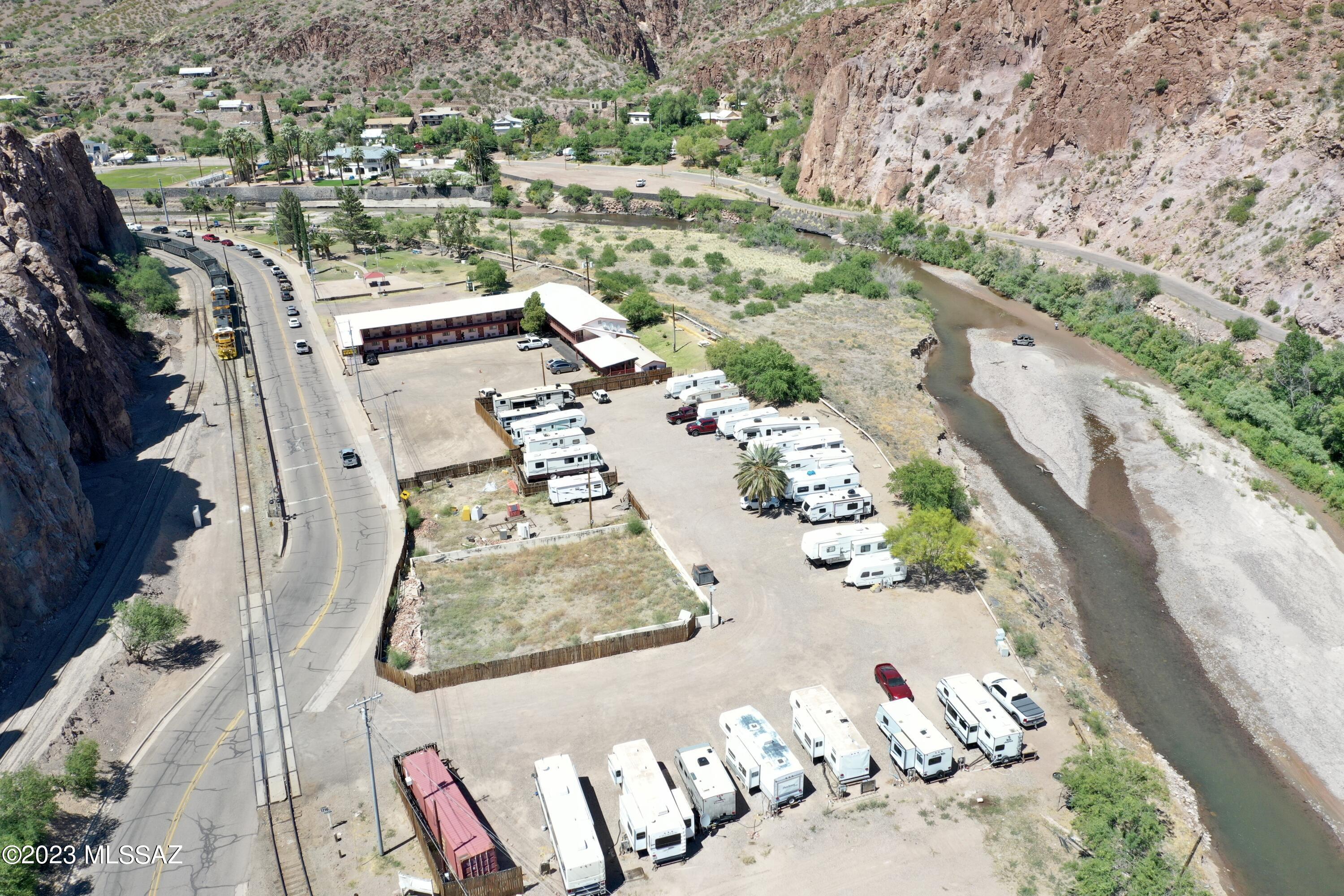 Amazing investment property in Clifton Arizona. This RV Park is located in the heart of Clifton on the banks of the San Fancisco River. The park is on 1.37 acres and has 23 spaces. Each space has city water, sewer and electric. The park is only 4 miles from the Freeport-McMoran Copper Mine in Morenci AZ and 43 miles north of Safford Az.