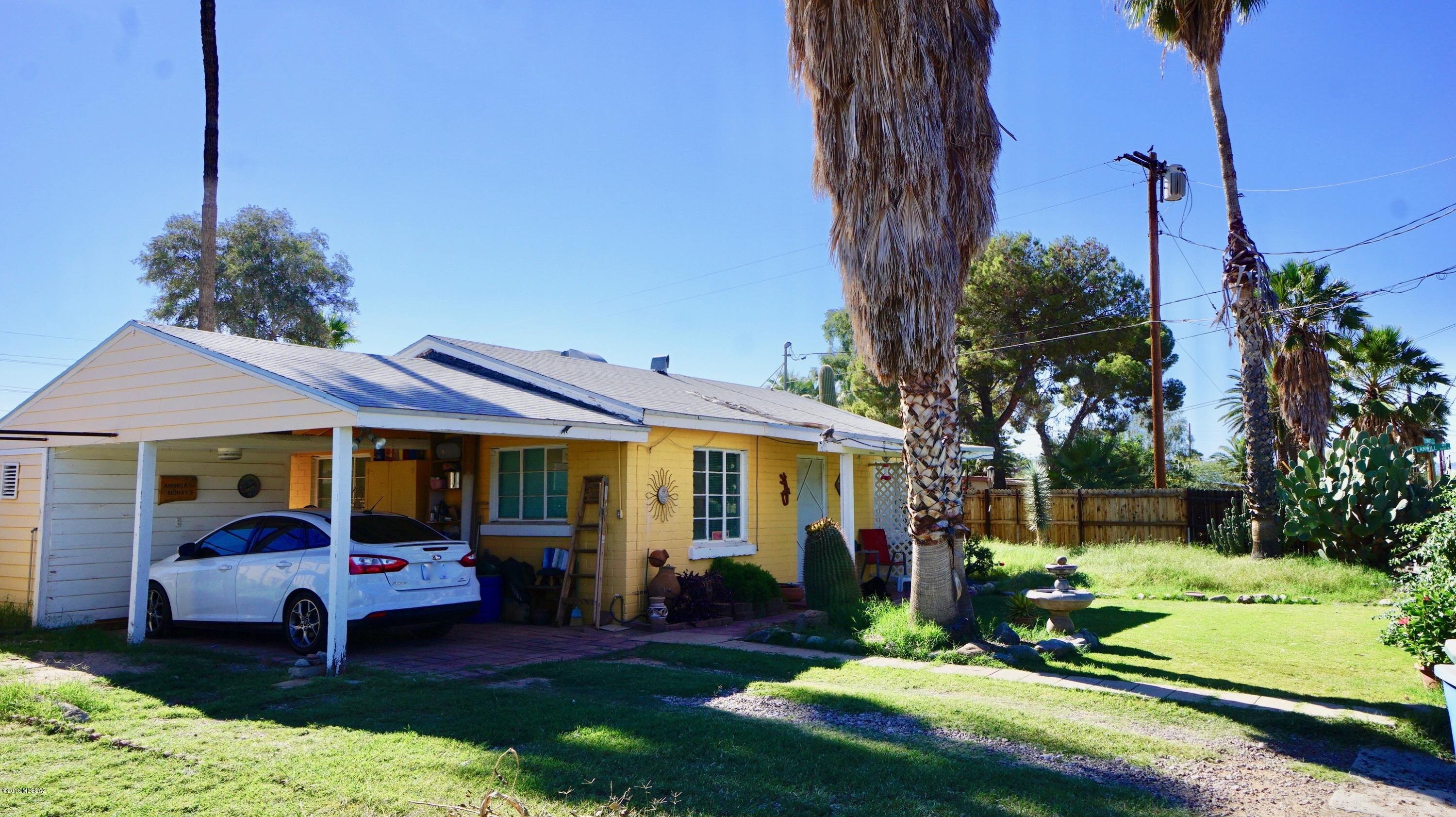 Super cute 2BD/1BA bungalow on spacious corner lot in central,  perfect for owner ocupied, winter visitors or investors. HUGE lot, zoned R2 with space for another structure. Fenced yard with shade trees, mature saguaro and very very private. Great location, convenient to schools, shopping and transportation. Lots of possibilities, bring your offers.
