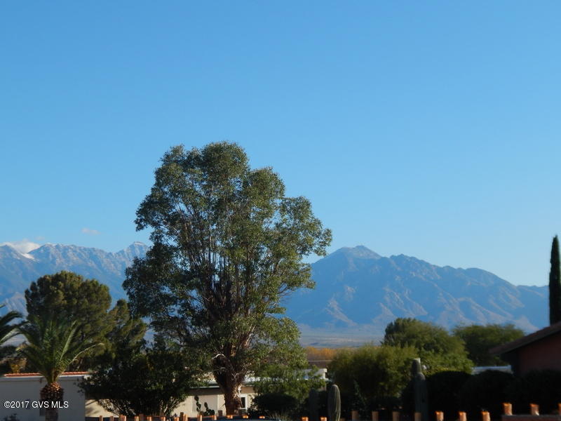 Front yard views and a very private back yard, provide a lovely place for entertaining. 2 bed, 2 bath with an additional Hobby room.
 Centrally located and close to the GVR East Center. Seller would consider a partial trade for a 2 bed villa.