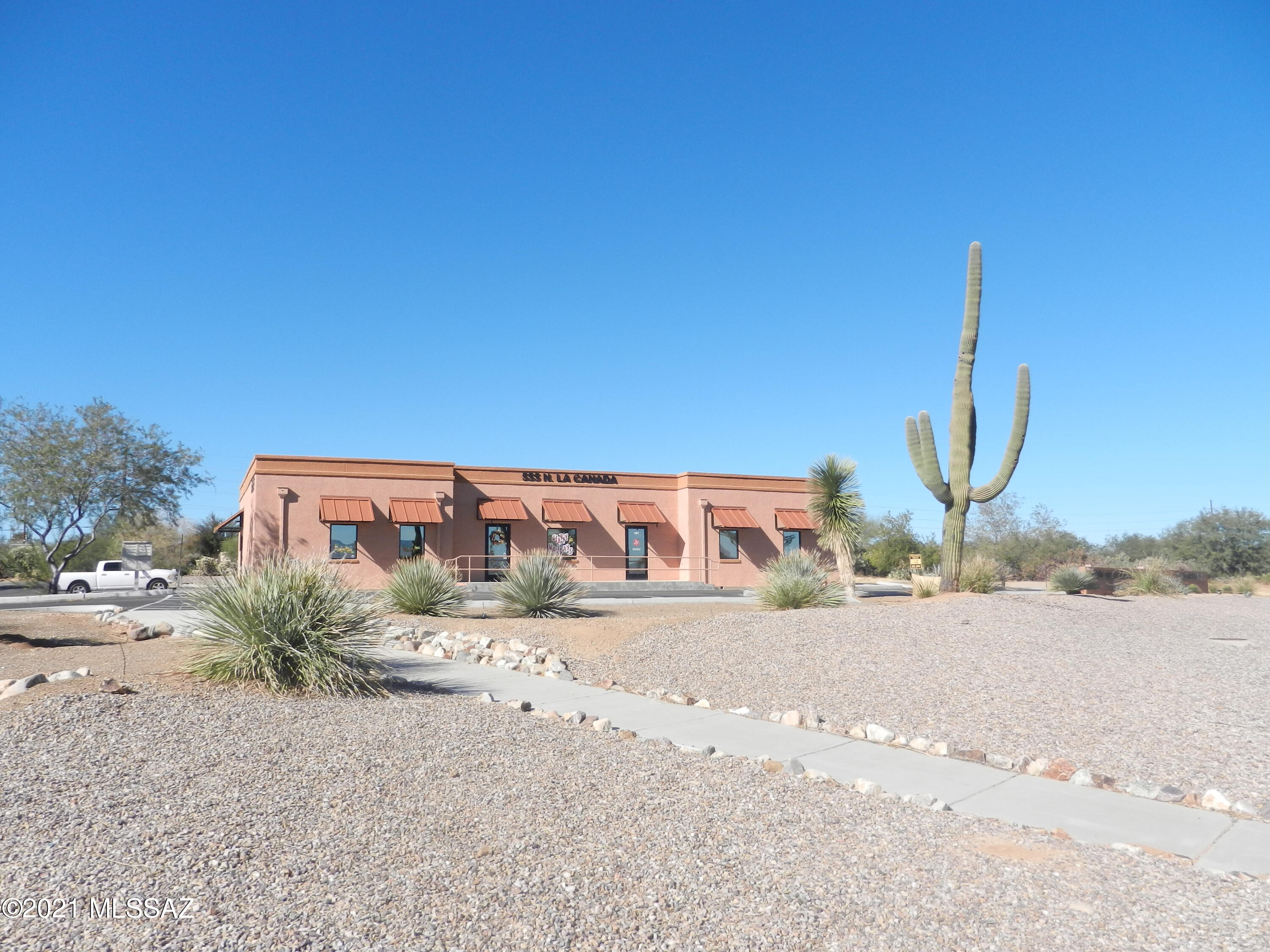 This highly visible landmark    building was the former fire station for Green Valley. The current owner purchased and totally redeveloped the entire building into retail/office space in 2013 with all new HVAC, electrical, plumbing, roof and       interiors.  It is home to the headquarters of the Green Valley         Coordinating Council, and the     Salvation Army offices. The suite in the back features a drive thru      window and a grease trap for        restaurant use.  This well          maintained property is adjacent to the main Pima County                Governmental headquarters and   The Conrad Joyner library. Both Salvation Army and The Green Valley Coordinating Council have renewed their leases for an additional 3 years.
