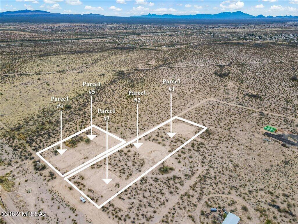 Beautiful 80 x 80 buildable pads, prepped and ready to build your dream home. Shared well between the 5 lots. Easy access to major streets yet secluded, serene desert views. 5 lots available separately or to purchase together. Call LA for more info.