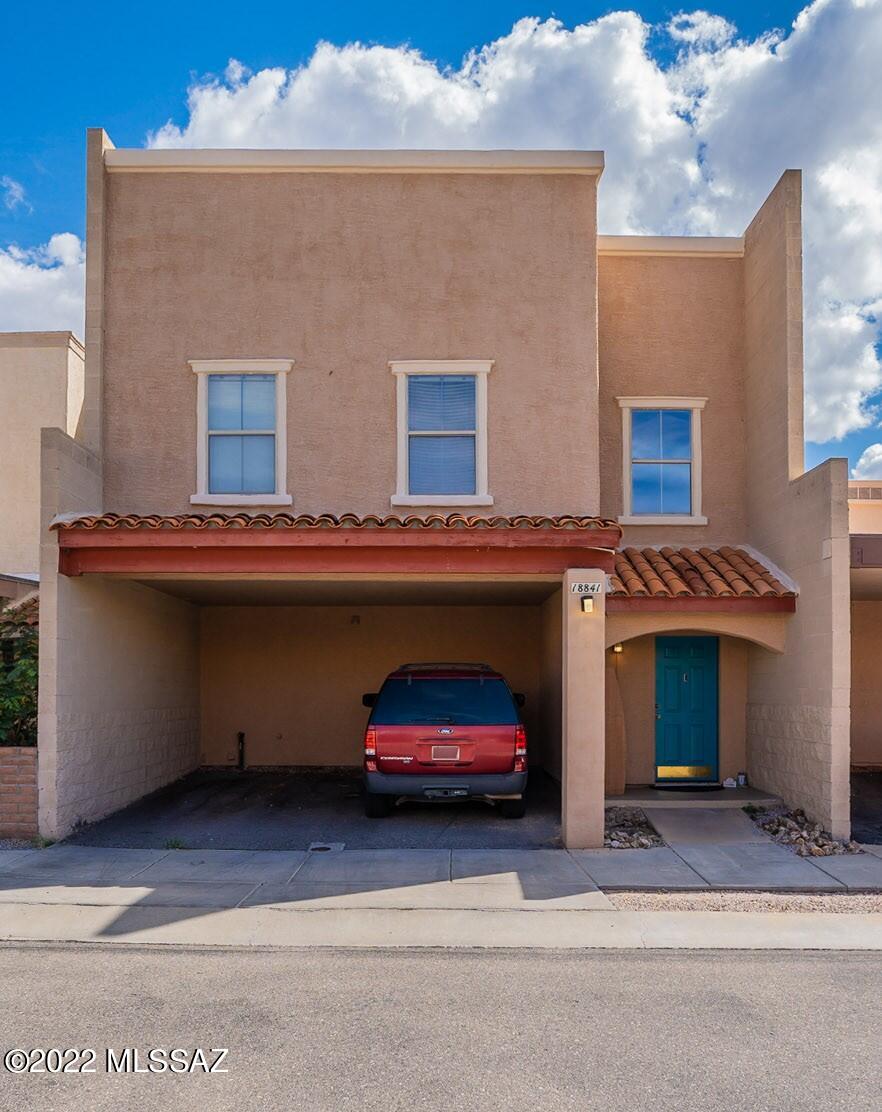 Spacious townhome centrally located near shops and restaurants. Step inside this townhome and you're greeted by soaring ceilings, and tons of light streaming through the large windows. The spacious living room offers plenty of room for friends and family, with a 1/2 bath downstairs for convenience. The dining room provides ample space for a table and additional storage pieces. The kitchen has ample counterspace and has a back closet for the washer/dryer and pantry.  Head upstairs with a decorative wrought iron railing to find three bedrooms all with walk in closets. The master bedroom has its own private balcony to enjoy your coffee in the morning! The HOA includes a pool and spa, a gym, and an event room you can rent for parties. What a great opportunity to own your own home!