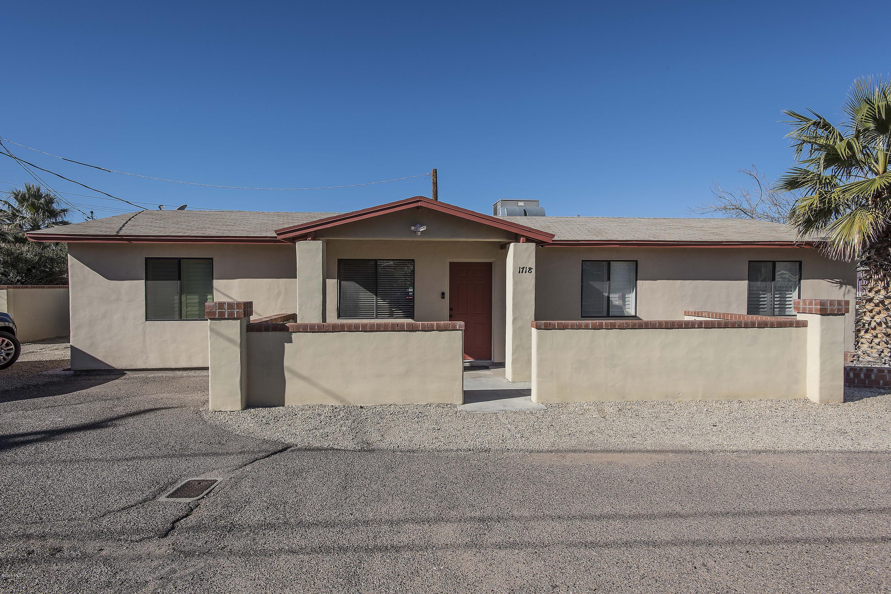 Young home for area! Only .25 miles from the main bike path along Mountain, the gateway to campus. 1.5 miles from the UofA and under a mile to the new medical center. The home received a recent refreshing. 2 year old carpeting, 2 year old paint, private fully enclosed, shady low maintenance backyard, private front courtyard, and dual pane windows. The home features a recently serviced air conditioning unit (installed in 2006) controlled by a SmartHome Nest Learning Thermostat controllable by a mobile device, updated ceiling fans in living room & master bedroom, energy efficient LED light fixtures throughout the home, new stainless steel appliances in kitchen (except for stove), recently serviced indoor laundry machines, new granite counter tops in both bathrooms with high end chrome fixtures, newly refinished bathroom cabinets, and new mirrors to compliment countertops. In addition, there is a permitted bonus room with separate A/C unit and separate entrance to the home, a full SimpliSafe alarm system and Ring Doorbell, also controllable by a mobile device. The home is walking distance to shopping, grocery, restaurants, retail outlets, shops, boutiques, and Starbucks along Campbell Ave. Just steps away from a family park, active with kids, dogs, and neighborhood events. This is a private off the road property with ample parking space and quiet neighbors. A must see energy efficient, hidden gem.