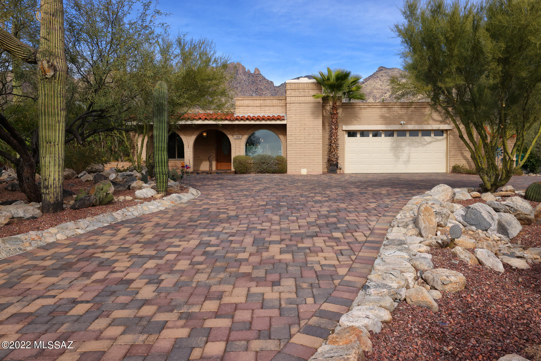 Outstanding Foothills Clusters home on a quiet cul-de-sac with sweeping Catalina
Mountain and Finger Rock views. Enjoy easy care, private rear yard with pebbletec pool
and spa. Large fully enclosed Arizona room w mini-split.. Interior offers neutral decor, gourmet kitchen, SS appliances, beautiful
wood floors, fireplace in living room, breakfast area and bar in kitchen.  A/C AND HEAT PUMP in 2017. SELLER OWNED SOLAR, agreement with TEP assumable. Newer dual pane windows, irrigation system,  hot water heater, range, dishwasher, washer, dryer, electrical panel, whole house humidifier and a lot more. (please see home improvement list) Beautiful paver driveway,
