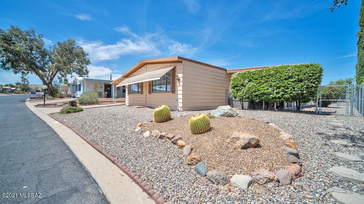 A charming and cozy home! Plantation Shutters dress up this fully furnished home that's ready for you to move in and enjoy the scenic views of Green Valley. There are many activities going on in Pueblo Estates, you can be as active as you want with the monthly calendar of events. The AZ Room provides extra space for your hobbies like painting, quilting, models, etc. plus there is an extra storage room. The kitchen is fully stocked with all the necessities. The double ovens covey ''as is''. The fenced yard is perfect for your little furry companion. The HVAC has been recently replaced, newer hot water heater, Plumbing under the house has been replaced, newer W/D, Dishwasher, & newer garbage disposal. Friendly neighborhood, close to shopping, restaurants, churches, and more! VERY INVITING!