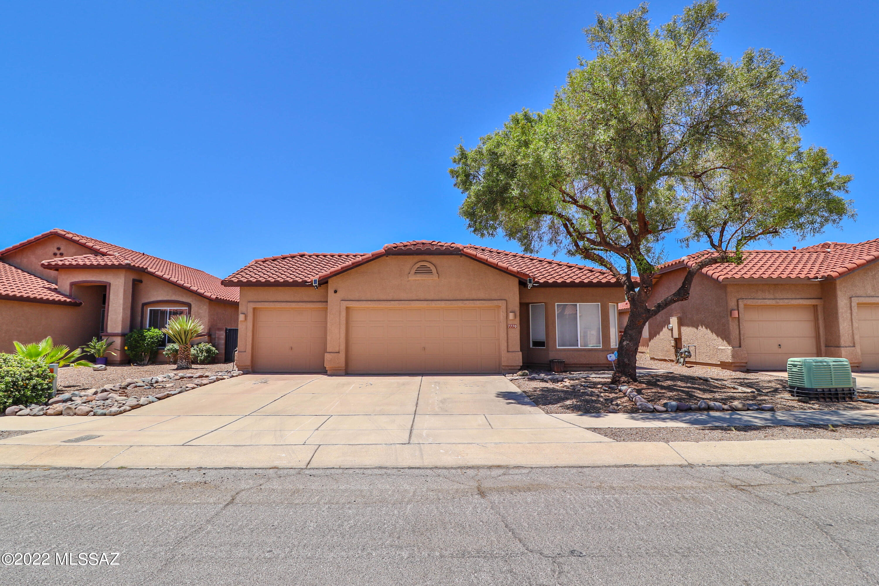 Rita Ranch!  Vail School District!  3 CAR GARAGE!  This 1569 SF home features 3 Beds and 2 Baths!  Split floor plan for extra privacy!  Tile in all wet areas with laminate in the Living room/dining room!  NEW CARPET in bedrooms!  Interior freshly painted!  Perfect sized kitchen features large pantry and stainless appliances!  Brand new dishwasher!  Large primary bedroom features large walk-in closet, primary bath features dual sinks and large garden tub! Washer and Dryer convey!  BRAND NEW HVAC INSTALLED!  Huge back yard!  Prime location close to groceries, restaurants, and so much more!  Schedule your showing today!