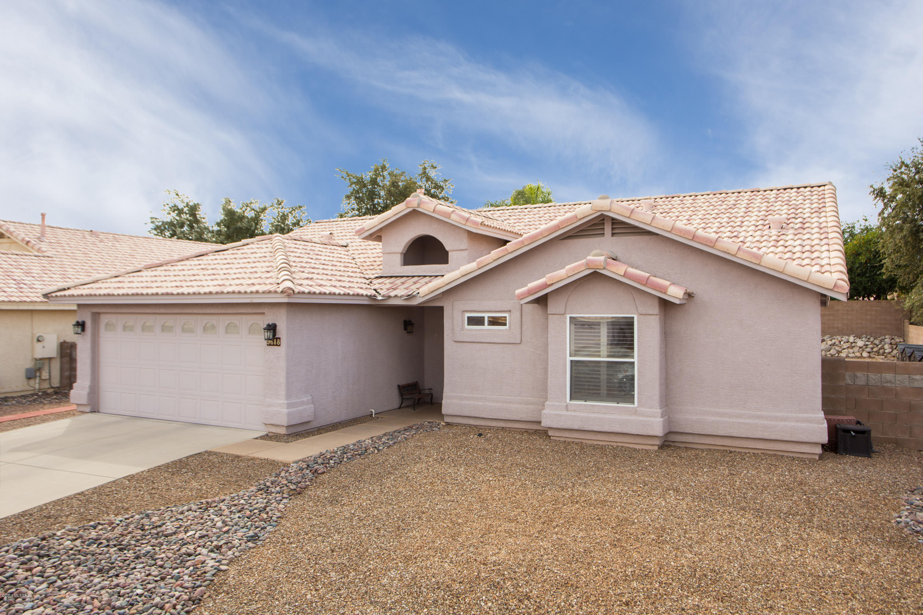 Absolutely stunning home nestled in a quiet neighborhood is this amazing home. The kitchen was recently expanded & renovated with white cabinets and grey granite which matches the new grey tone flooring. You can not get better than this! The Master bedroom was extended to include a sitting area, exercise space or just a place to relax. The Bathrooms have been renovated as well. Newer windows, leaded glass door. Not to leave out the Arizona Room which adds another room for entertaining or fun filled evenings with family & friends. This meticulously cared for home will not last long. Appliances are still under warranty. All light fixtures are LED except closet. Call now for an appointment.