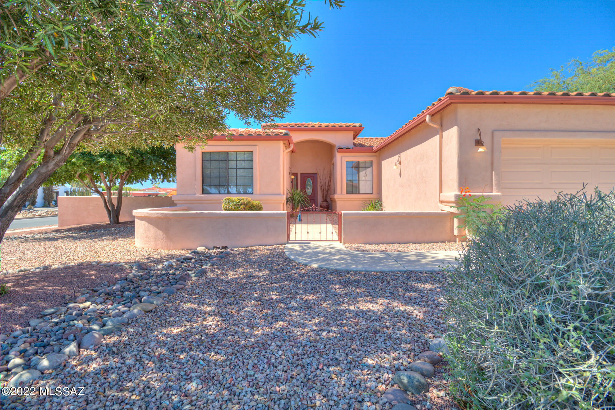 This home is a winner! Move-in ready with spectacular views of the Santa Rita Mountains from the house and the big corner lot. 3 BR/2BA, newer kitchen stainless appliances, 2022 Trane HVAC, newer hot water heater, tile roof. Desert-adapted landscaping with drip system. This one owner home has been lovingly maintained.