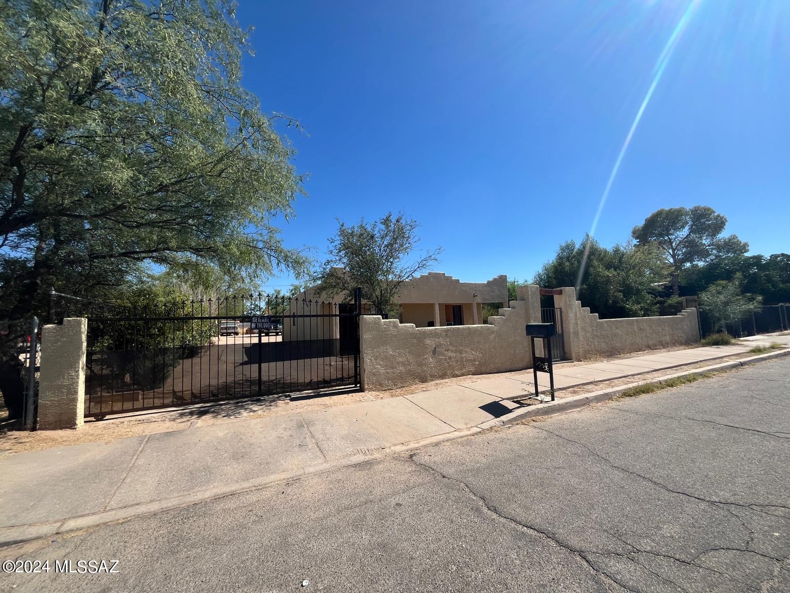 This charming Santa Fe style 2-bedroom, 1-bath home with A/C sits on nearly 1/4 acre and is ideal as a starter home, rental property, or renovation project. The spacious lot offers potential for RV parking, or the addition of a shop or guest house. Recent updates include a new electrical service panel (2019), new water main and updated shower (2020), and a new roof and A/C (2021). Contact the agent today to schedule a showing!