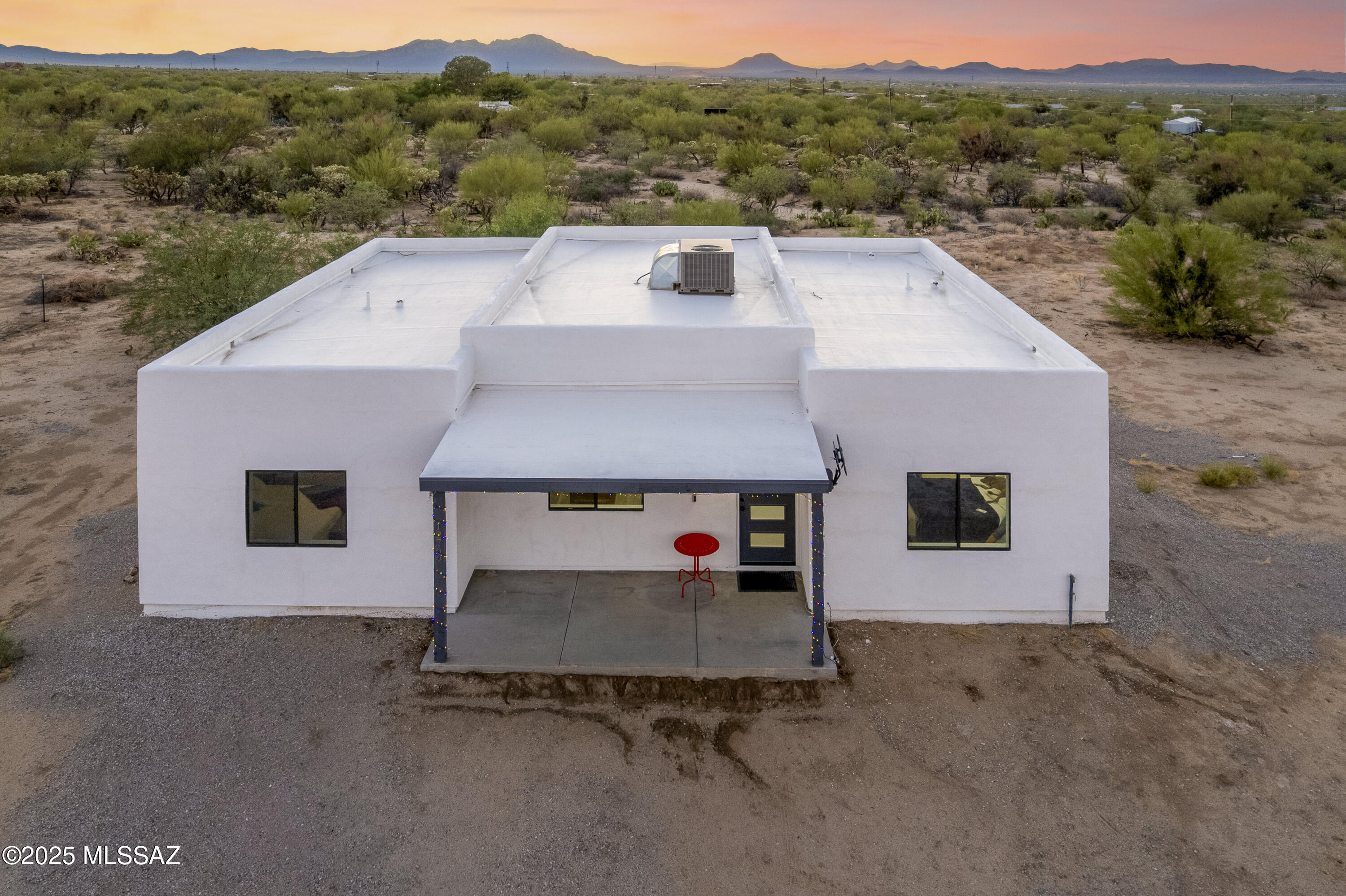 Built in 2023, this unique 3-bedroom, 2-bath home sits on 1.4 acres surrounded by desert beauty. Enjoy incredible sunsets and star-filled skies with nearby Saguaro National Park and the dark skies of Kitt Peak. Designed for both comfort and privacy, the property is partially gated, on public water, and features a private septic system. With room for animals and space to make it your own, this home offers the perfect blend of modern convenience and rural charm. Whether relaxing under endless stars or taking in peaceful desert views, this property delivers calm, connection, and the freedom to create your own retreat.