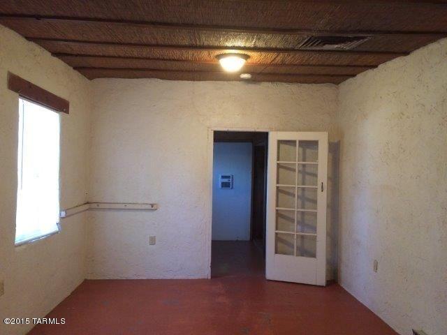 Fantastic duplex that is always rented. Duplex is located near Speedway/Country Club with close proximity to U of A, downtown, bus lines, shopping, and restaurants. Cute Bungalow style tile roofs, private yard entrances into units with concrete floors, exposed wood ceilings, free standing fireplaces, and built in bookcases. Large fenced rear yard. Replumbed in 2004 and new roof in 2015.
