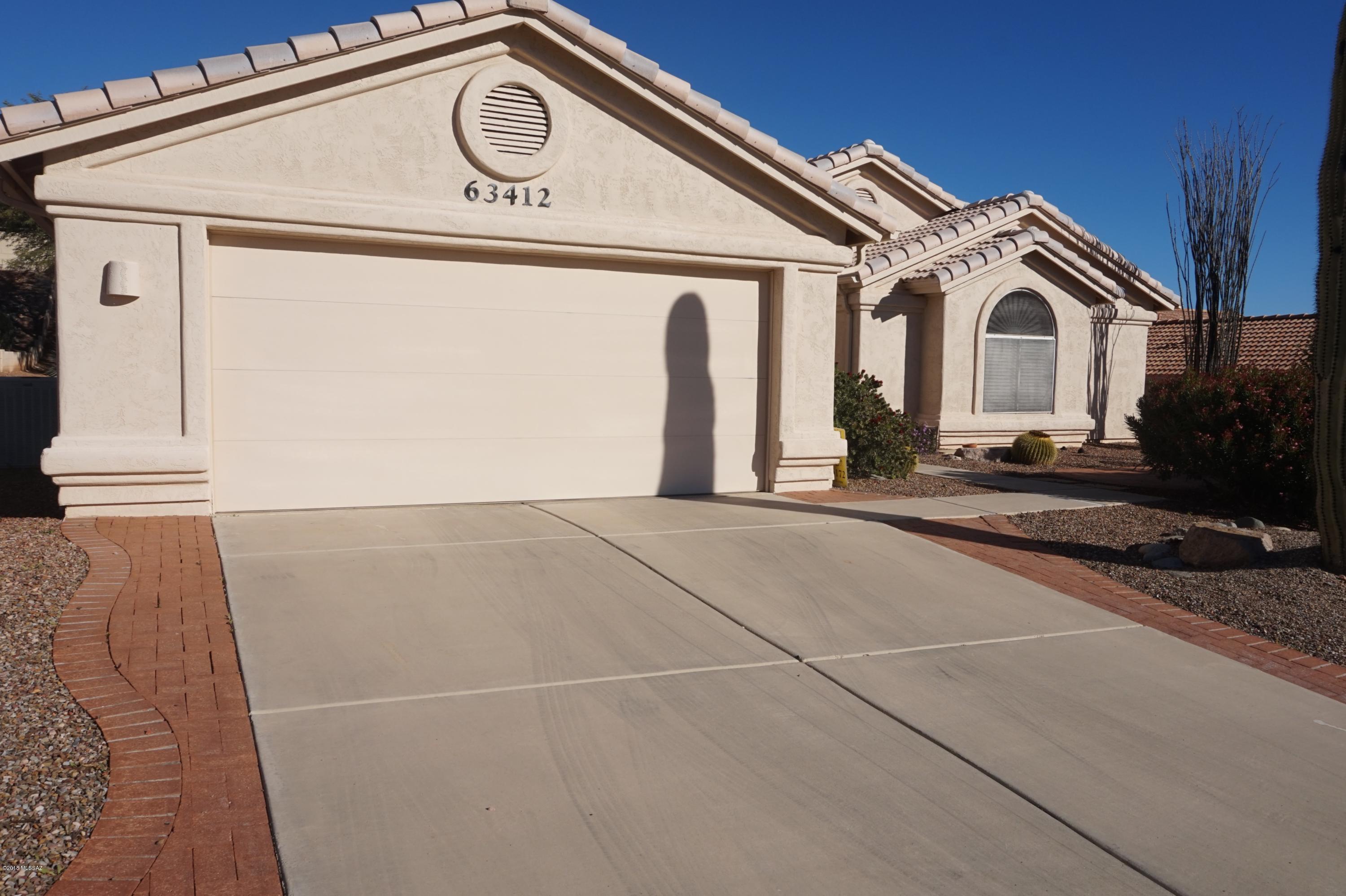Popular 3 BR Topaz Model on oversized North/South facing mountain view lot (10,522 sf).
Entry Foyer opens to spacious LR/DR w/built-in shelves flanked by oak cabinets. Family Rm w/slider to extended covered Patio. Kitchen w/abundant cabinetry, gas range, micro, d/w, refrig, double stainless sink, wrap around cabinets to desk area, sunny Breakfast Bay, oversized Laundry Rm w/cab'ts, washer, dryer. Master BR suite w/slider to Patio,  MBath w/dual sinks, shower, walk-in closet. BR2 or Den w/closet, Hall Bath w/tub, BR3 w/walk-in closet. 2 Car Garage w/Storage Cab'ts. Enjoy morning coffee on the front brick patio w/mountain views; dine on the rear covered patio & watch the sunset color the mountains on the extended brick terrace. All Saddlebrooke amenities for a wonderful retirement lifestyle