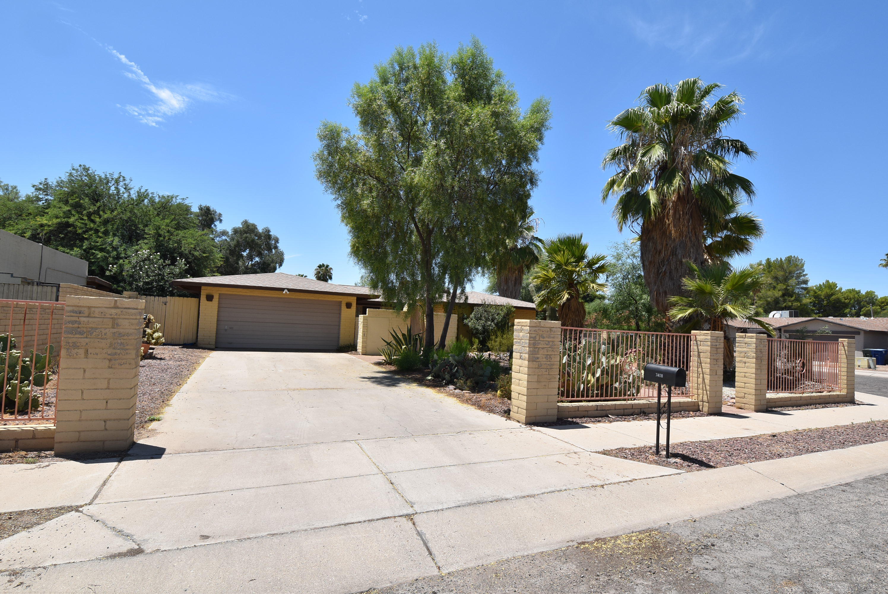 Great location!  2 bed/2 bath home with pool and 2 car garage in desirable northeast community of Vista del Rio.  This is a fantastic sought after centrally located neighborhood near Udall Park and community center plus lots of recreation, shopping and restaurants nearby.  Roof 2008, new water heater and pool equipment. Give this home a little love to make it your own. Good bones with lots of potential and the price reflects the need for cosmetic updating.   Home will transfer as-is with no repairs.  HOA voluntary.  Gas to property but not in use.