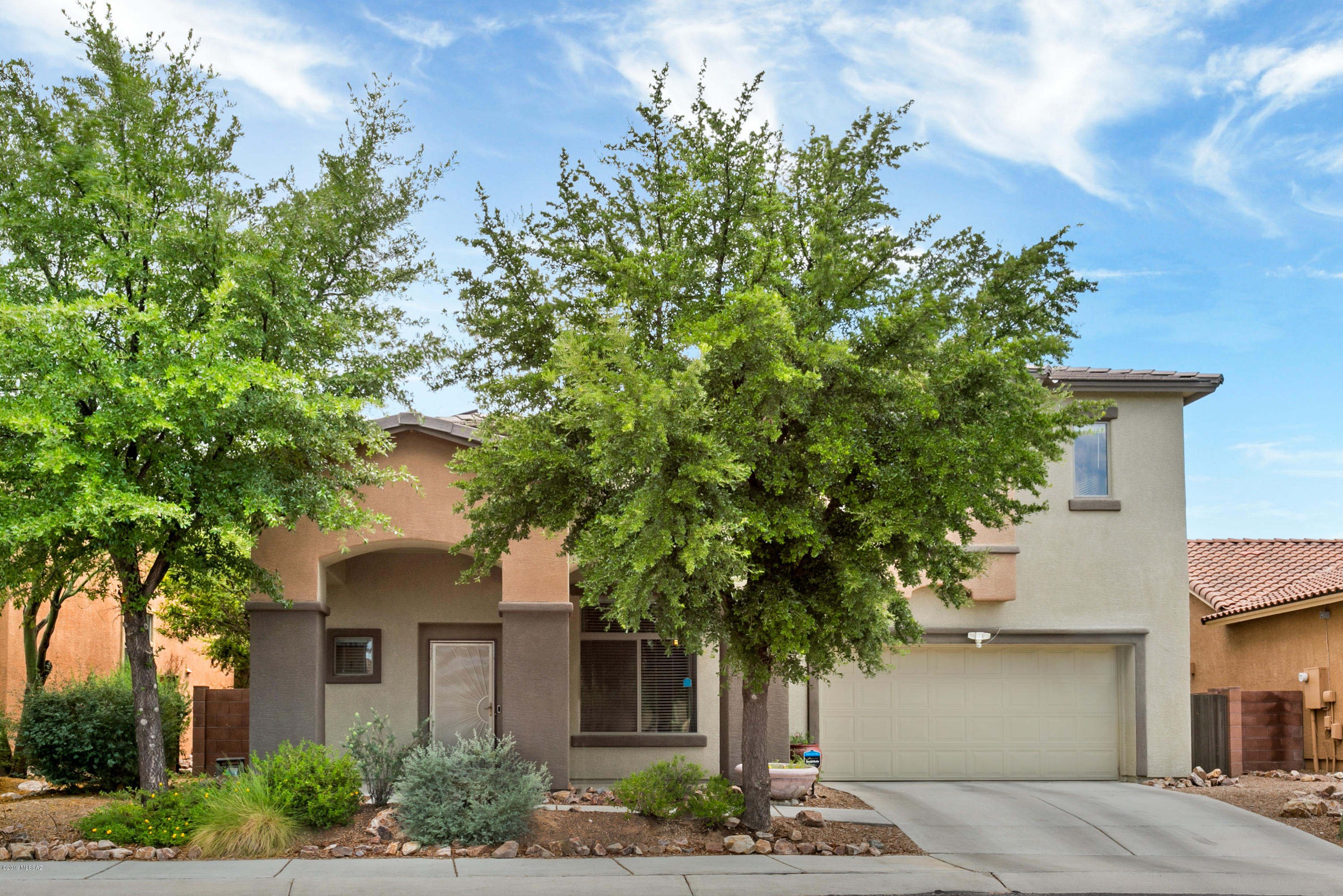 *OPEN HOUSE Sunday 7/28 12-4pm*  Welcome to this move-in ready, former model home in the desirable Sycamore Park Village! This stunning 2 story charmer has over $200k of builder upgrades! Home features a large updated gourmet kitchen w/upgrades cherry wood cabinets, executive height island & granite counter tops. Built in dry bar w/beverage refrigerator & bonus room that is perfect for 5th bedroom, guest quarters or game room. 2nd story features a loft area, large master suite complete w/walk in closet & recently updated bathroom. Master has private walk out balcony that extends the full length of home to enjoy majestic mountain views! Spacious backyard features a Pebble Tec pool w/swim up bar. Large covered patio & built in BBQ make this a perfect space for entertaining. Water softener/storage in garage. Sycamore Park Community has a nearby park with recreational activities. Located in Vail School District. Minutes to Amazon Warehouse, DMAFB, Raytheon and easy Freeway Access.