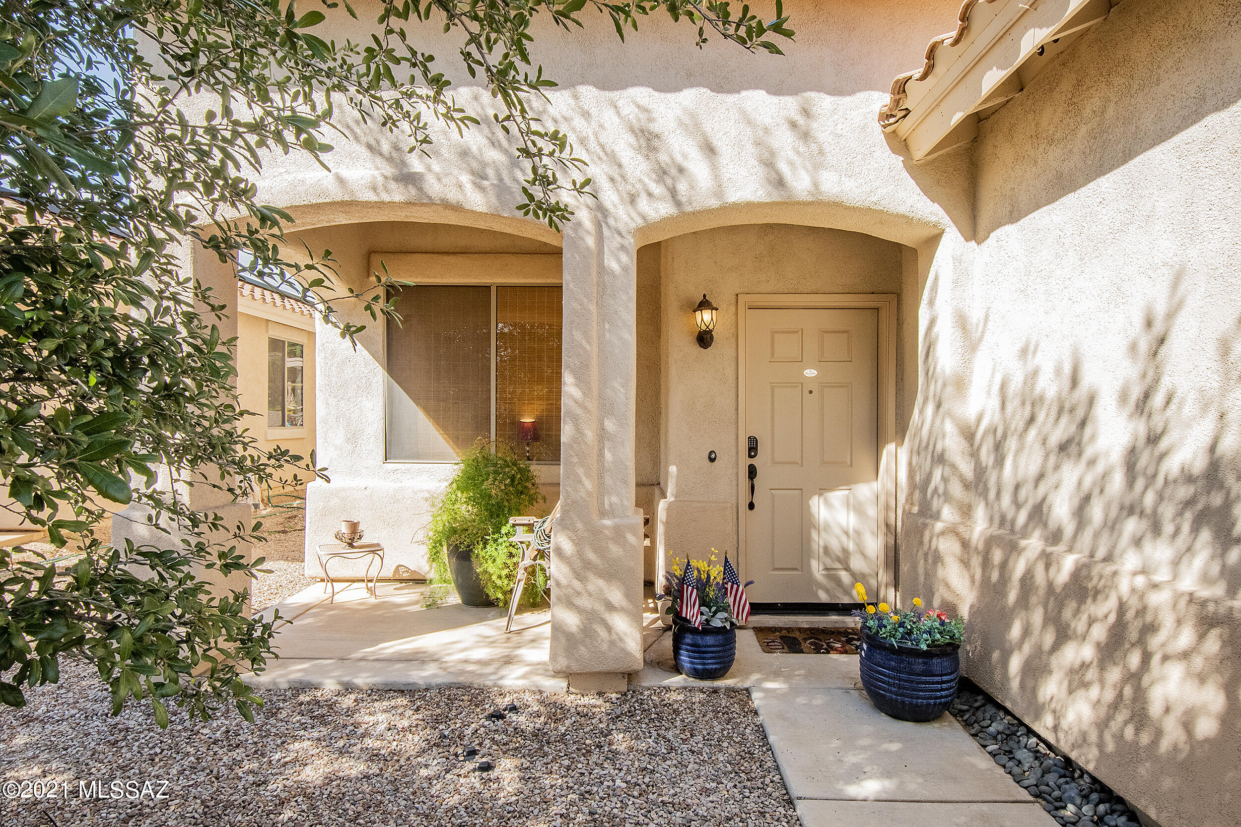 Original owner four bedroom, three full bathroom home in Rancho Sahuarita featuring two ensuite bedrooms and two guest rooms! Second ensuite bedroom upstairs is massive and could be split into two  to make the home five bedrooms. Ground floor bedroom is located next to a full guest bathroom. Large family room is open to the kitchen with stainless steal appliances and breakfast bar. Laminate flooring throughout the first floor, with waterproof premium vinyl plank flooring in upstairs bathrooms. Expansive backyard with beautiful shade trees has endless possibilities: Pool? Turf? Built in BBQ? Koi pond under the pergola (fish not included). This home has all the room you need and is ready for you to bring in your personal touches! Call today for a private showing!