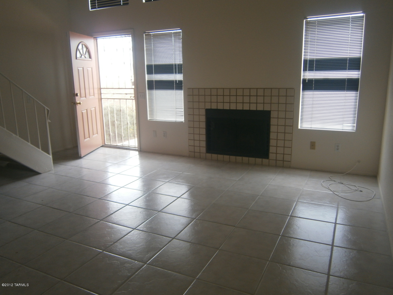 Two story condo in a great location. Convieniant to Pima College, St. Mary's Hospital, and U of A. Golf, parks, shopping, and entertainment just minutes away.