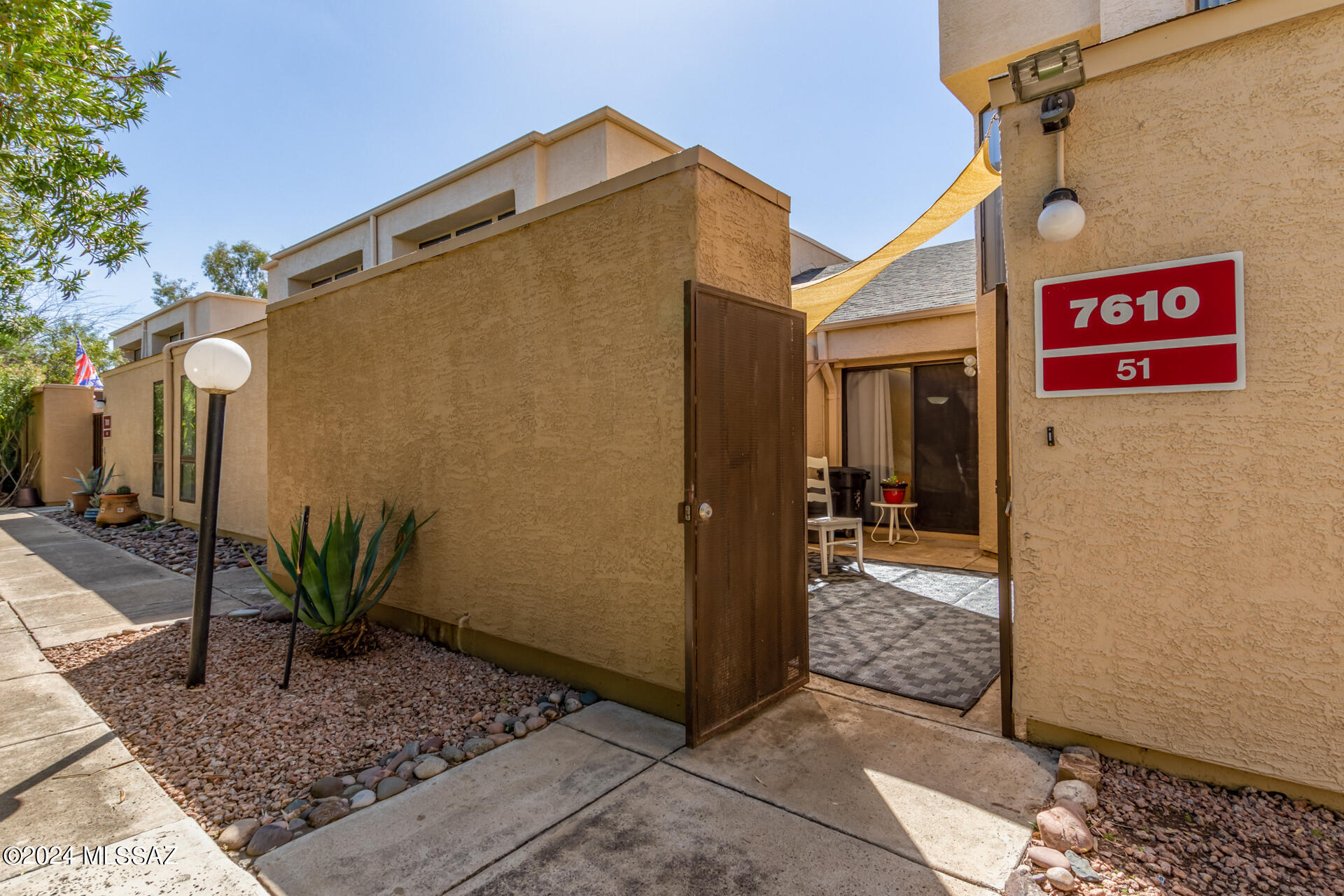 Upgraded Condo with ample parking close to shopping and schools now ready for you!  New HVAC and Water Heater. This home is in the Coronado Place Condominiums II development. 2 large bedrooms and 2 large baths, one on main floor and one upstairs, with natural light.  Plenty of closet space. Bottom bedroom has a sliding door out to the spacious covered patio. Patio has storage, water faucet and privacy door to the complex. Your pets and plants will appreciate the sun rays in this secluded space. Amazing kitchen has butcher block counter tops, stainless steel appliances, and a sitting/breakfast bar for dining and entertaining. Hallway washer and dryer nook on bottom floor of unit.  Plenty of storage spaces around the unit for your belongings. Check out the amenities including a pool and spa