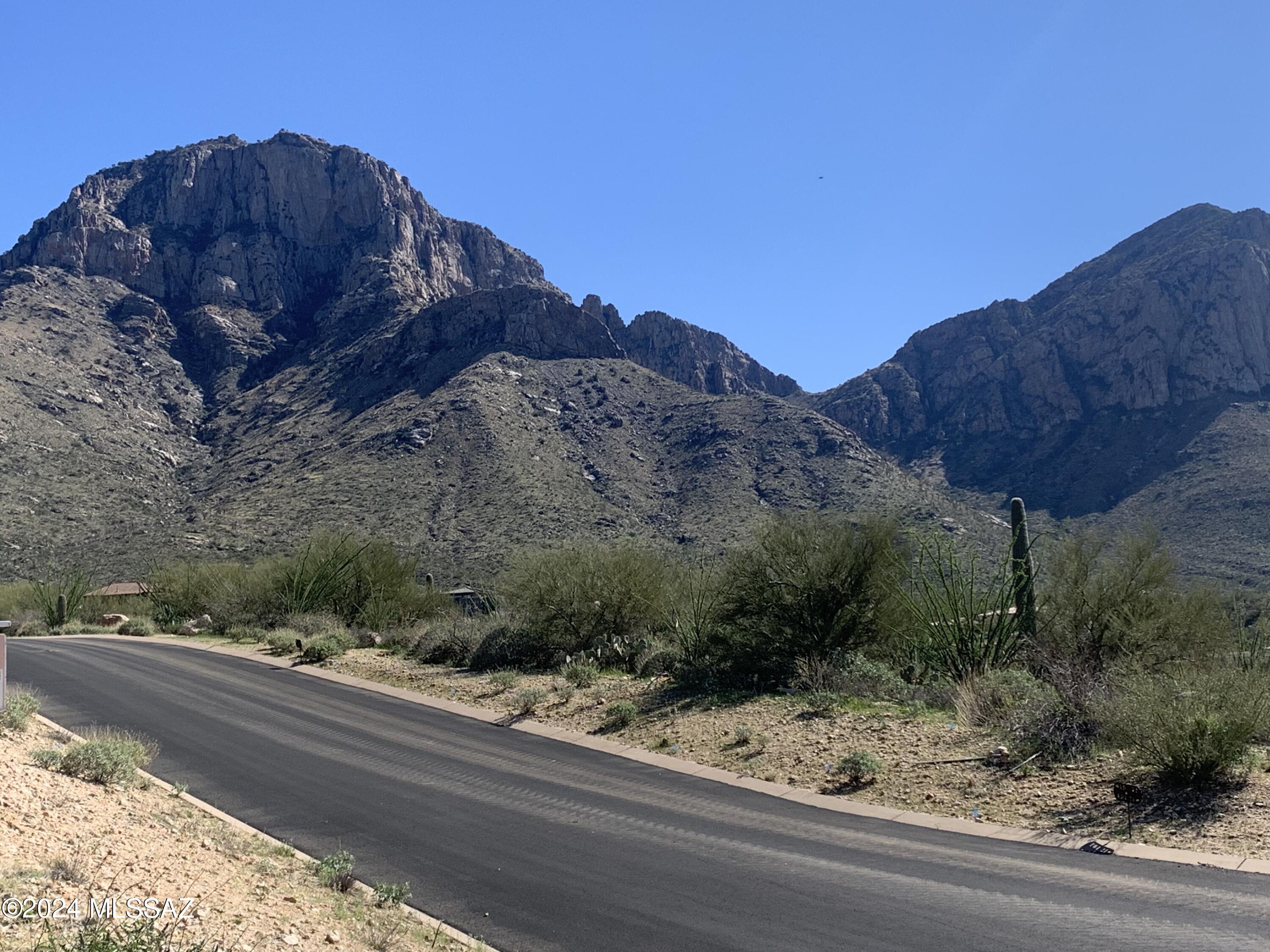City and mountain views in a gorgeous gated community. Large build envelope and an exceptional build site on nearly 5 acres. Adjacent lot 67 is also available for purchase and could be purchased together. Tax ID is for a larger parcel, lot will receive a new tax ID after recording.