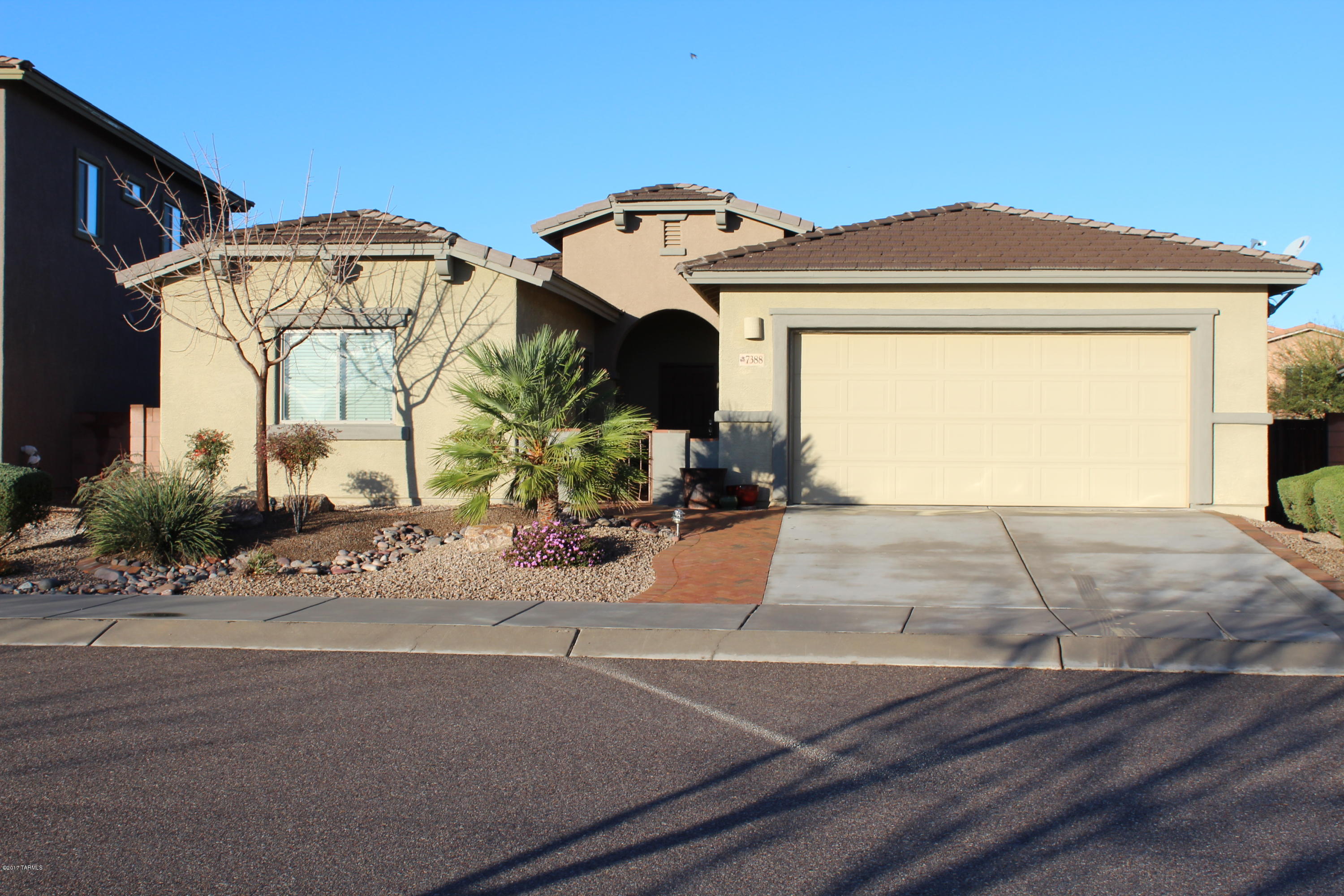 Beautiful 3BR/2BA, plus Den (Easy 4th bed conversion) home located in the highly desired Sycamore Park Village and coveted Vail School District. This Spacious floor plan features:  Pre-eng hard wood main living areas/tile in wet areas & Carpet in bedrooms, Crown Molding, 3/car tandem gar can be used as a work shop, storage, man cave, etc., granite counter tops, slide-out kitchen shelving, 42 inch Cabinets w/Crown Molding and a Master suite that includes a full walk-in closet, Garden Tub, double sink w/makeup vanity and will accommodate a King bedroom set with plenty of room to spare!  Retreat to your outdoor space and enjoy the built in BBQ, fire pit, waterfall in the Backyard and located Across the Street from the Soccer Field and Amenities!! Move In Ready and A Must See…Welcome Home!!