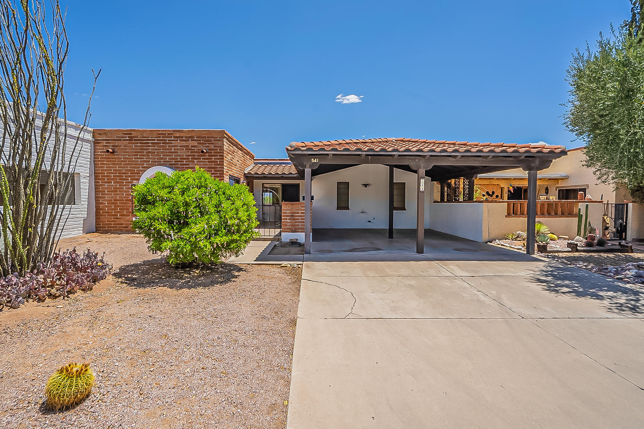 Welcome to this Quaint Green Valley Bungalow Style Home with Views to Inspirer. Sit by the beehive fireplace as you gaze at the Gorgeous  Santa Rita Mountains. Enjoy your morning beverage in your Cozy front court yard. You'll love the large bright kitchen. Tile throughout with two car carport.A home to bring you joy!!!